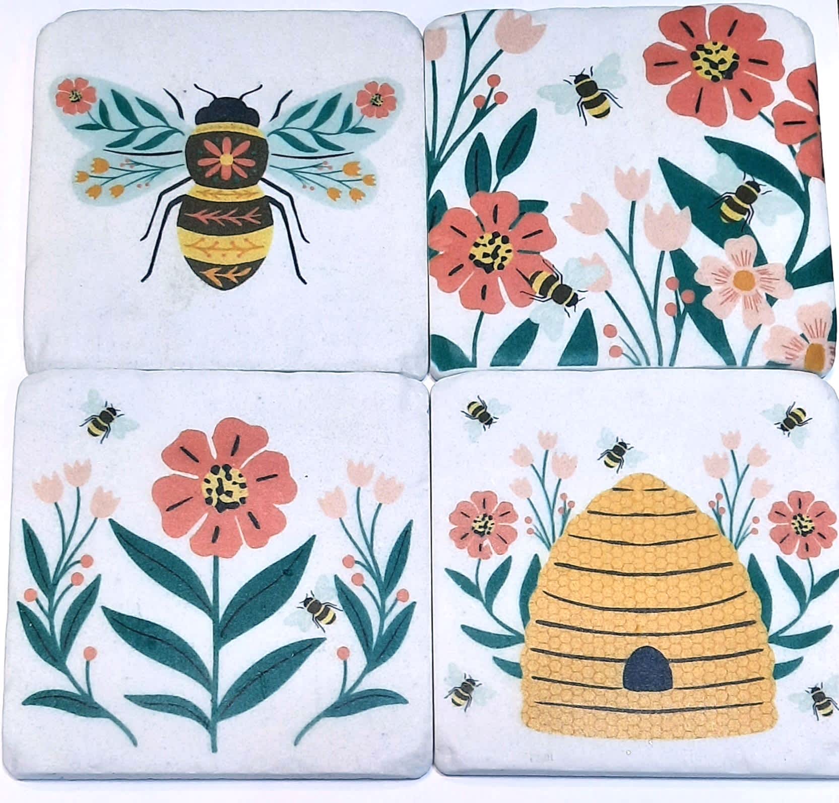 Creative Coasters-Bee &amp; Beehive - Un-bee-lievablely cute drink coasters! A perfect gift for yourself or another, this four piece coaster set is made out of resin and has scratch-preventive cork on the bottoms! The coasters measure 4 inches by 4 inches. Please note some of the sets come in a box and others have been hand-tied with a ribbon bow.
