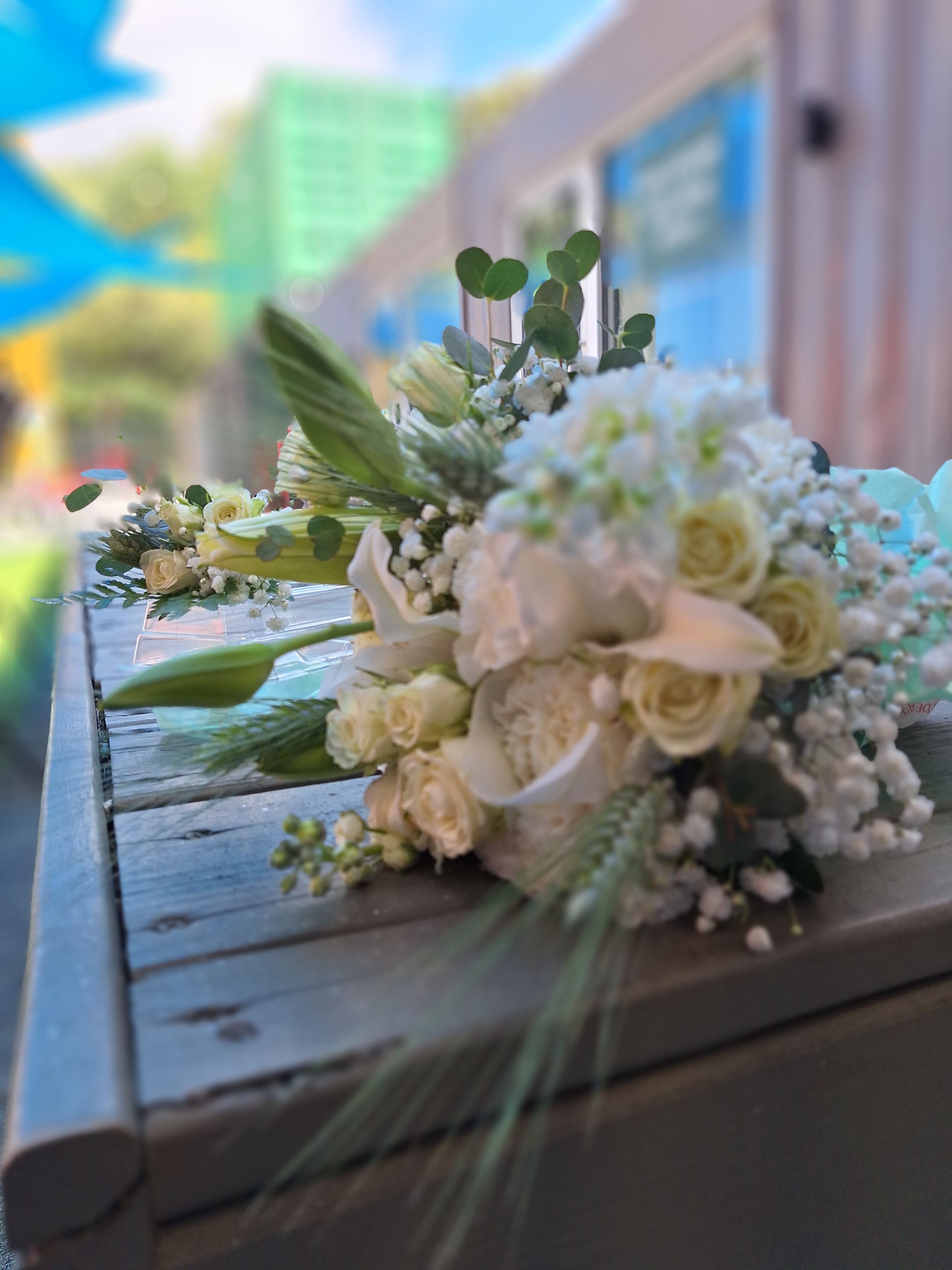 The Royal Quickie - An all-white wedding set with boutonniere and wrapped Bridal bouquet. Lissen', we love LOVE over heh' and love a lil' pop-out and &quot;I do!&quot; Perfect for weddings and anniversary celebrtions.