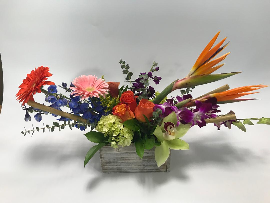The Manhattan - A distinctive design with bright mixed flowers.  Great for a centerpiece or coffee table,