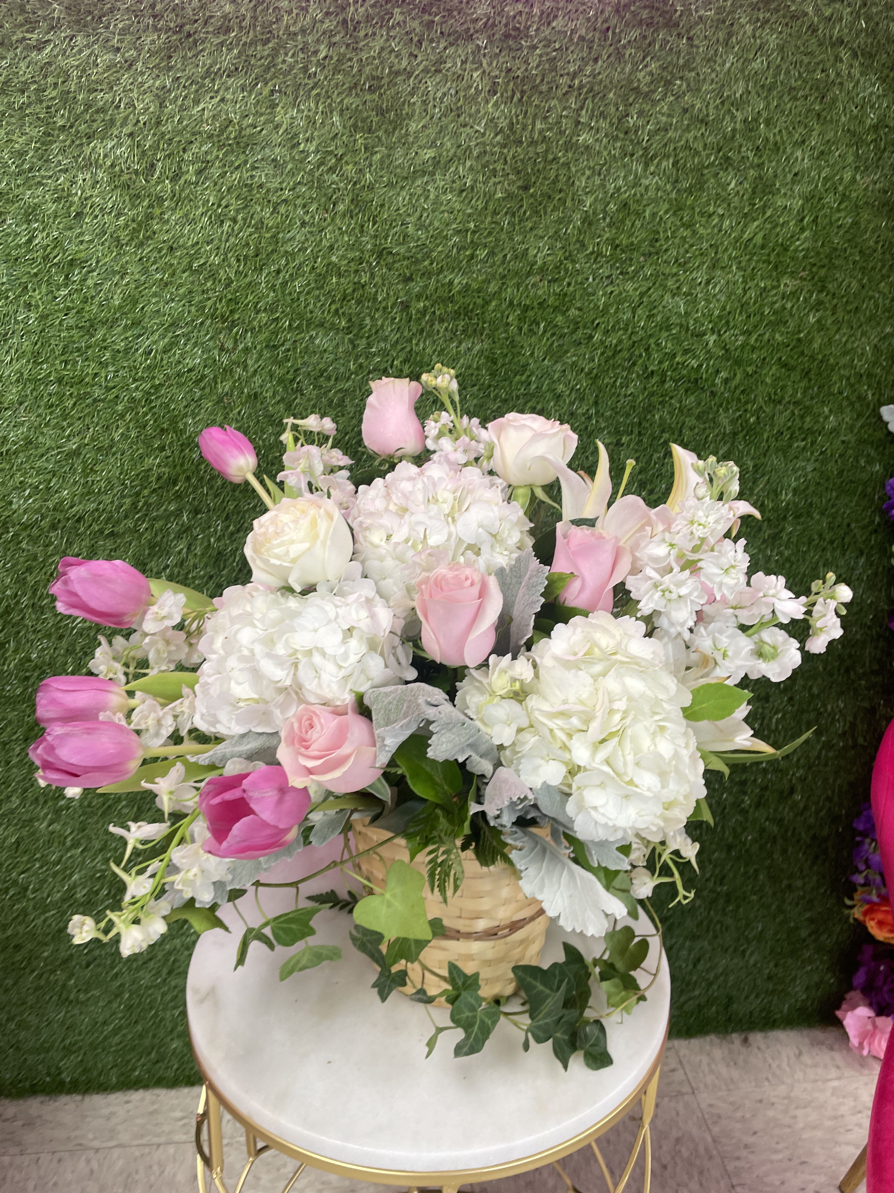 Lean on Me  - A large pastel-colored basket suitable for sending to the home after the service, Lean on Me by BloomNation™ features roses, hydrangeas, tulips, ivy, and dendrobium orchids.  Approximate Dimensions: 18&quot;D x 12&quot;H