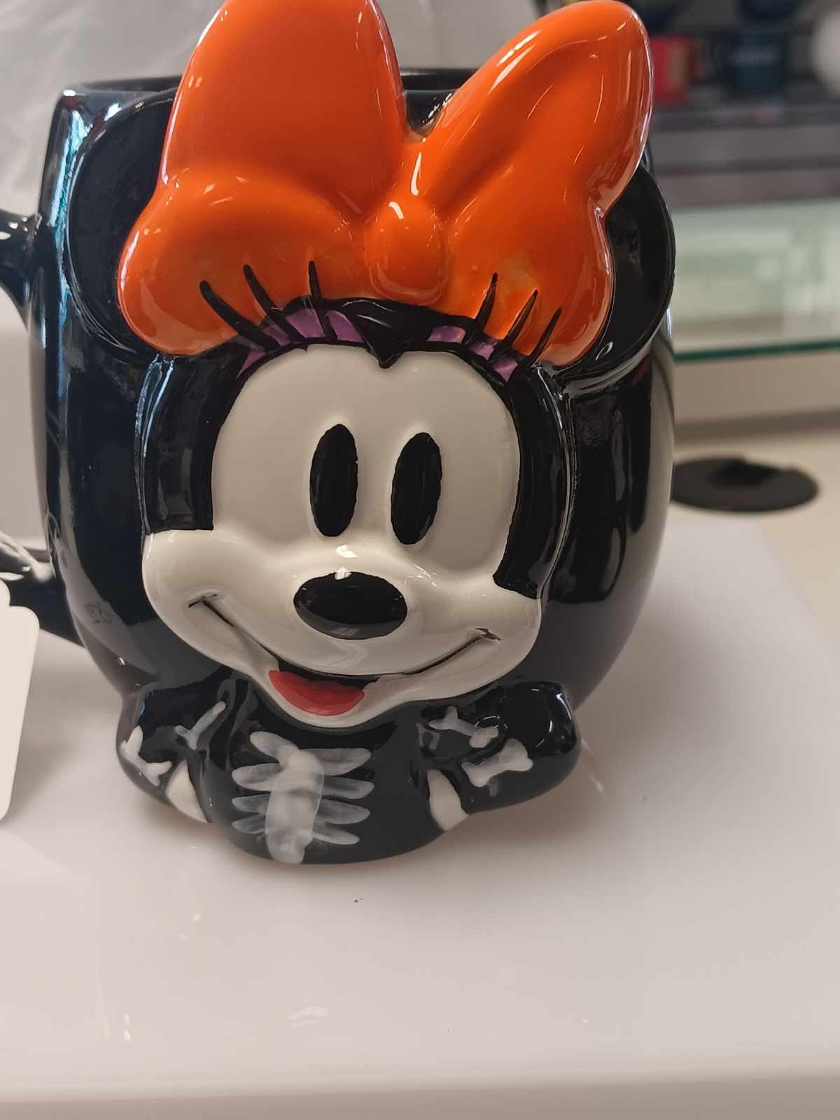 Halloween Minnie Mug Halloween Minnie Mug - Halloween mug can be used a a base for a floral arrangement or add it to any of our floral items as a an awesome gift. *if using as a base please call the shop to make your order*