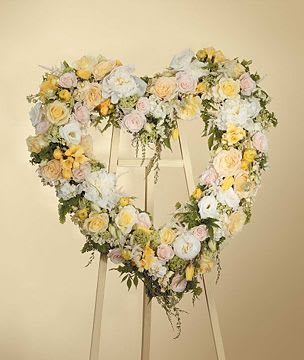 Open heart Open heart - Open heart in whites and yellows with a touch of light pinks . Please note peonies will be substituted.