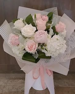 Soft pink and white bouquet Soft pink and white bouquet - light pink roses, peonies and hydrangeas bouquet wrapped in soft color papers