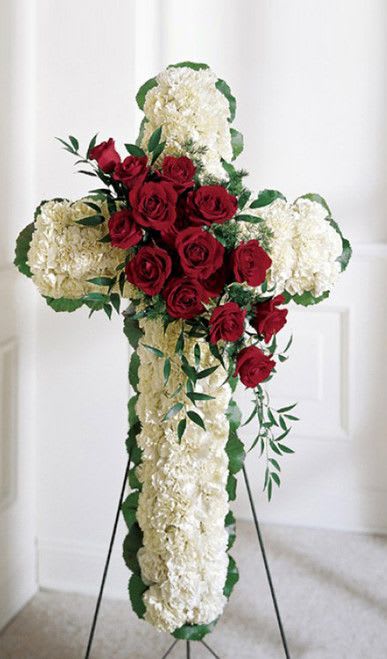 Deluxe Standing Cross Deluxe Standing Cross - Deluxe standing cross made with Carnations with Red Roses.