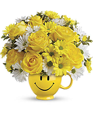 Teleflora's Be Happy® Bouquet with Roses Teleflora's Be Happy® Bouquet with Roses - When you're looking to make someone smile, this happy face mug of roses and daisies is tops. Sure to cheer up everyone from a beloved wife to a busy boss, these are also great flowers for kids. Yellow roses and daisy spray chrysanthemums along with white daisy spray chrysanthemums and oregonia are delivered in Teleflora's one and only yellow happy face, Be Happy® mug..