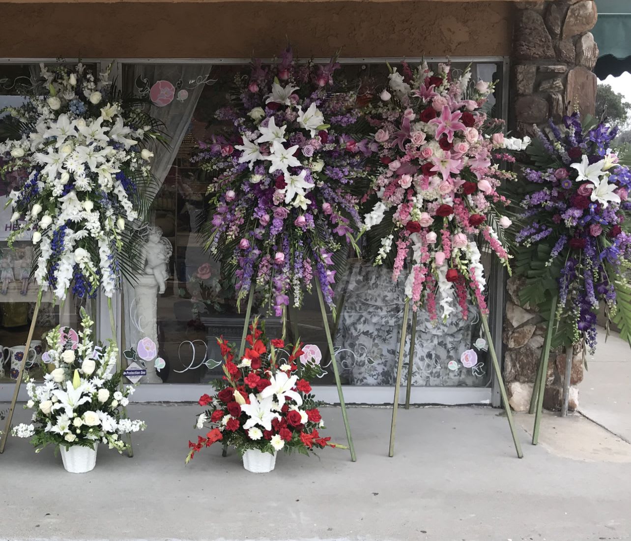 Tribute Package 1 - 4 Large Standing Spray easels, 2 large baskets   (Color selection can be all the same or different for each one)  