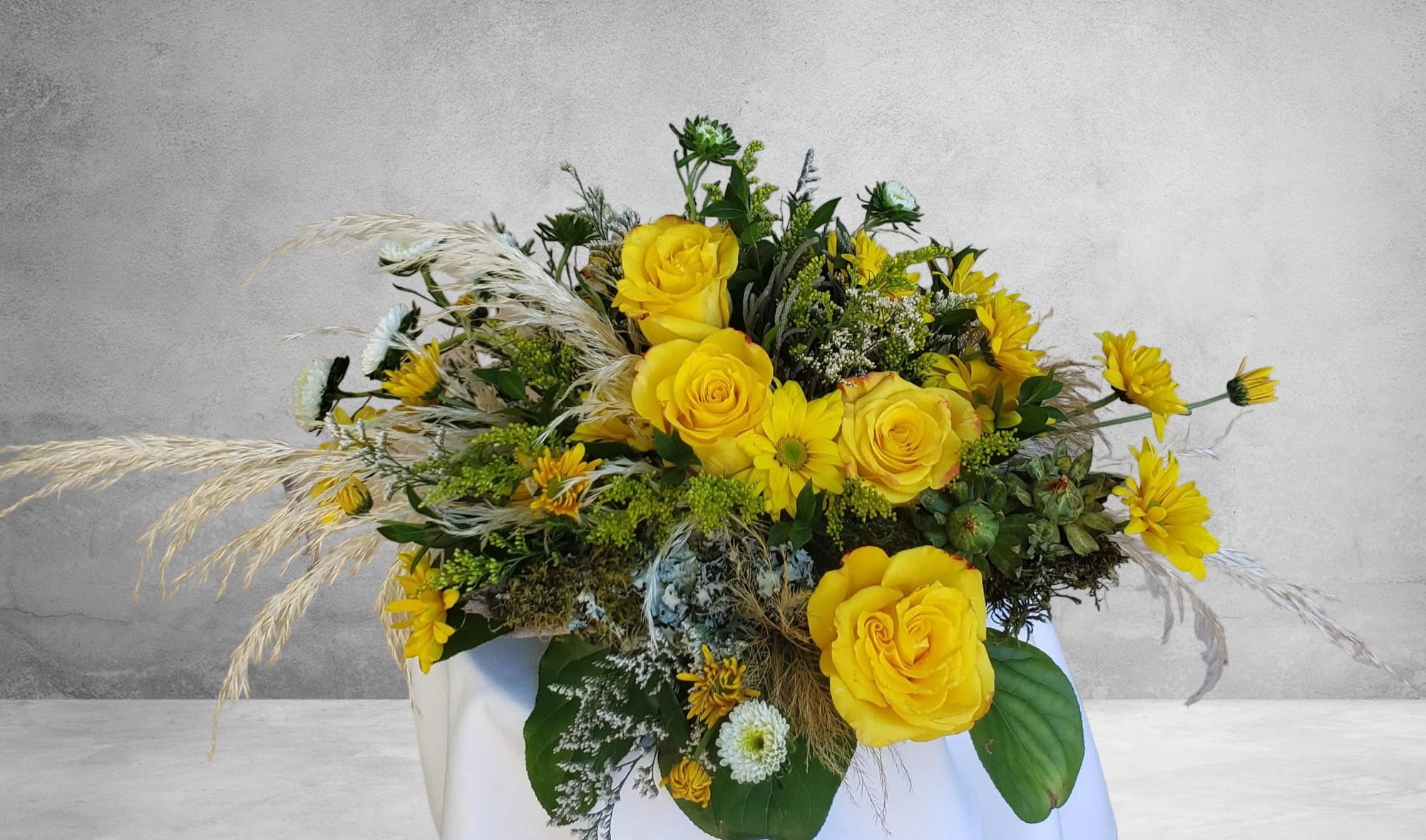 Let the Sunshine In Let the Sunshine In - Description: At our Olympia, WA flower shop, we understand the value of a sunny day in Washington. That's why we've crafted the Sunshine Celebration Bouquet, a radiant and joyous arrangement that perfectly captures the essence of a beautiful, sun-kissed day in the Pacific Northwest. Product Highlights: Yellow Roses: Radiating warmth and happiness, these yellow roses are the centerpiece of this vibrant bouquet, symbolizing the sun's radiant glow. Daisies: Like the blue skies on that perfect Olympia day, our daisies add a touch of serenity and calm to this arrangement. Solidago: As bright as a sunbeam, solidago complements the cheerful color palette, making this bouquet truly shine. Celebrate any occasion with the Sunshine Celebration Bouquet, whether it's a special day, a gesture of appreciation, or simply a reminder of the beauty that surrounds us in Olympia, WA. Brighten someone's day and let the sunshine in with this enchanting arrangement. Order now and bring the warmth and radiance of Washington's sunny days into your life.