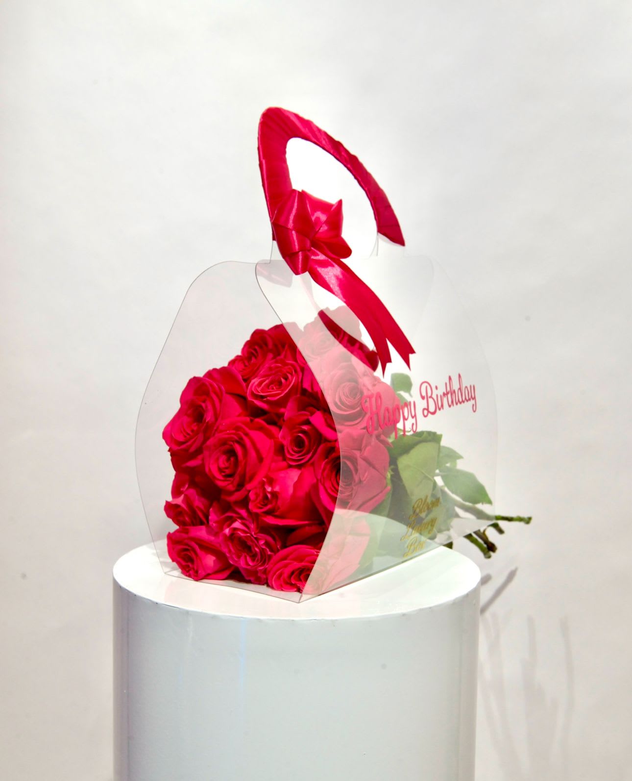 hot pink roses bouquet with transparent gift bags