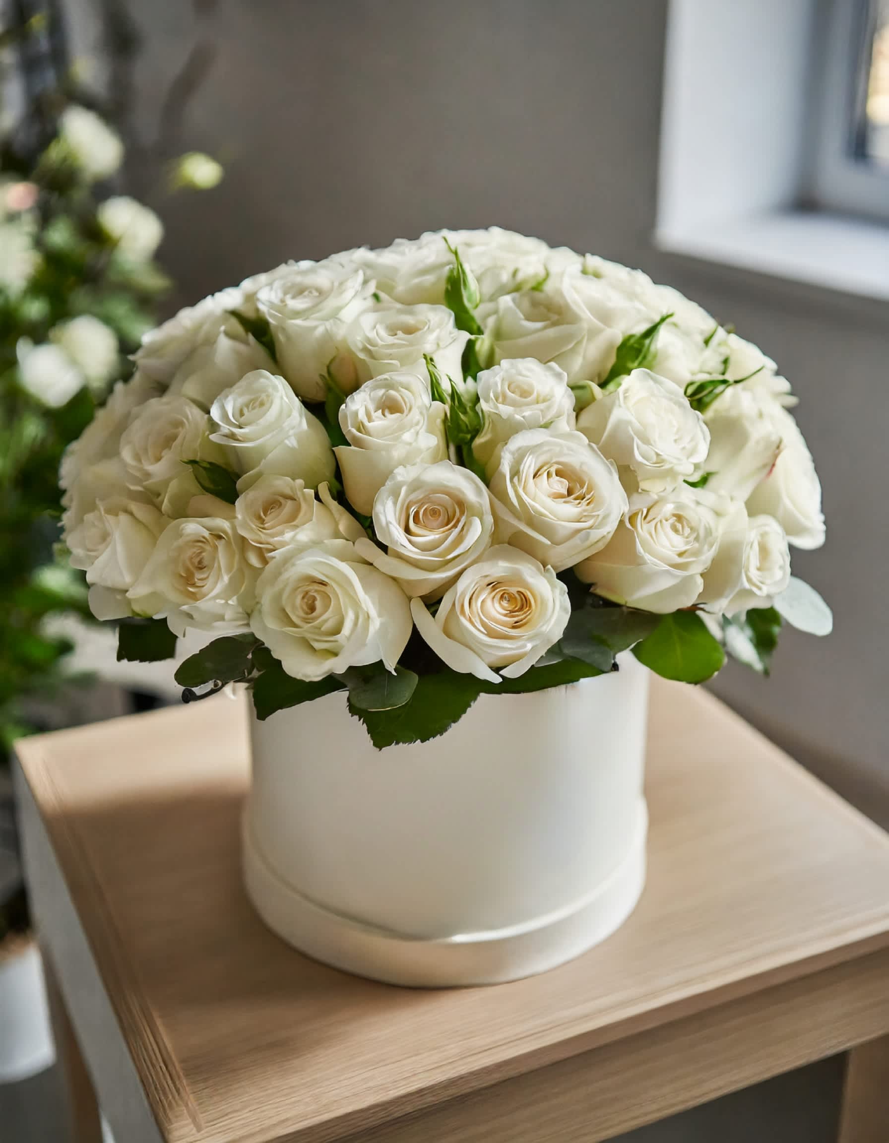 Lunar Eclipse Lunar Eclipse - Our luxury box of white roses is a win-win option as all women love white roses. Touched along the edges with delicate greenery, it gives the roses even more freshness.