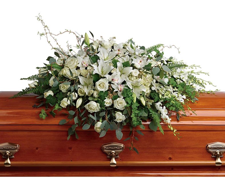Lily, Rose & Orchid Casket Spray Lily, Rose & Orchid Casket Spray - As serene as gently falling snow, this pure white spray of hydrangea, orchids, roses and lilies is a heartfelt symbol of peace and beauty--a symbol that will remain a guiding light to your loved ones for years to come. This stunning spray features white hydrangea, white cymbidium orchids, white dendrobium orchids, white roses, white spray roses, white oriental lilies, curly willow, green ivy, parvifolia eucalyptus, seeded eucalyptus, silver dollar eucalyptus, sword fern, and lemon leaf. Our arrangements are unique, custom gifts designed by hand. Mother Nature changes our farm-fresh inventory every morning; to assure your gift is fresh and gorgeous our artists may need to make substitutions but will capture the color & style of your selection to deliver a "WOW" for your recipient.