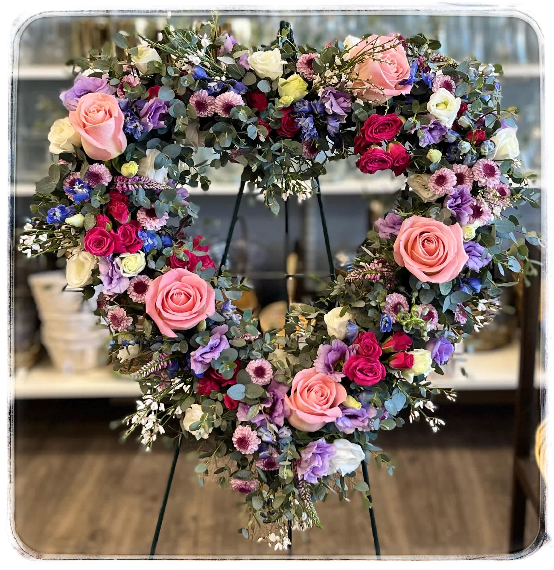 Graceful Heart Graceful Heart - This is a sympathy arrangement in the shape of a heart. It is multicolored.