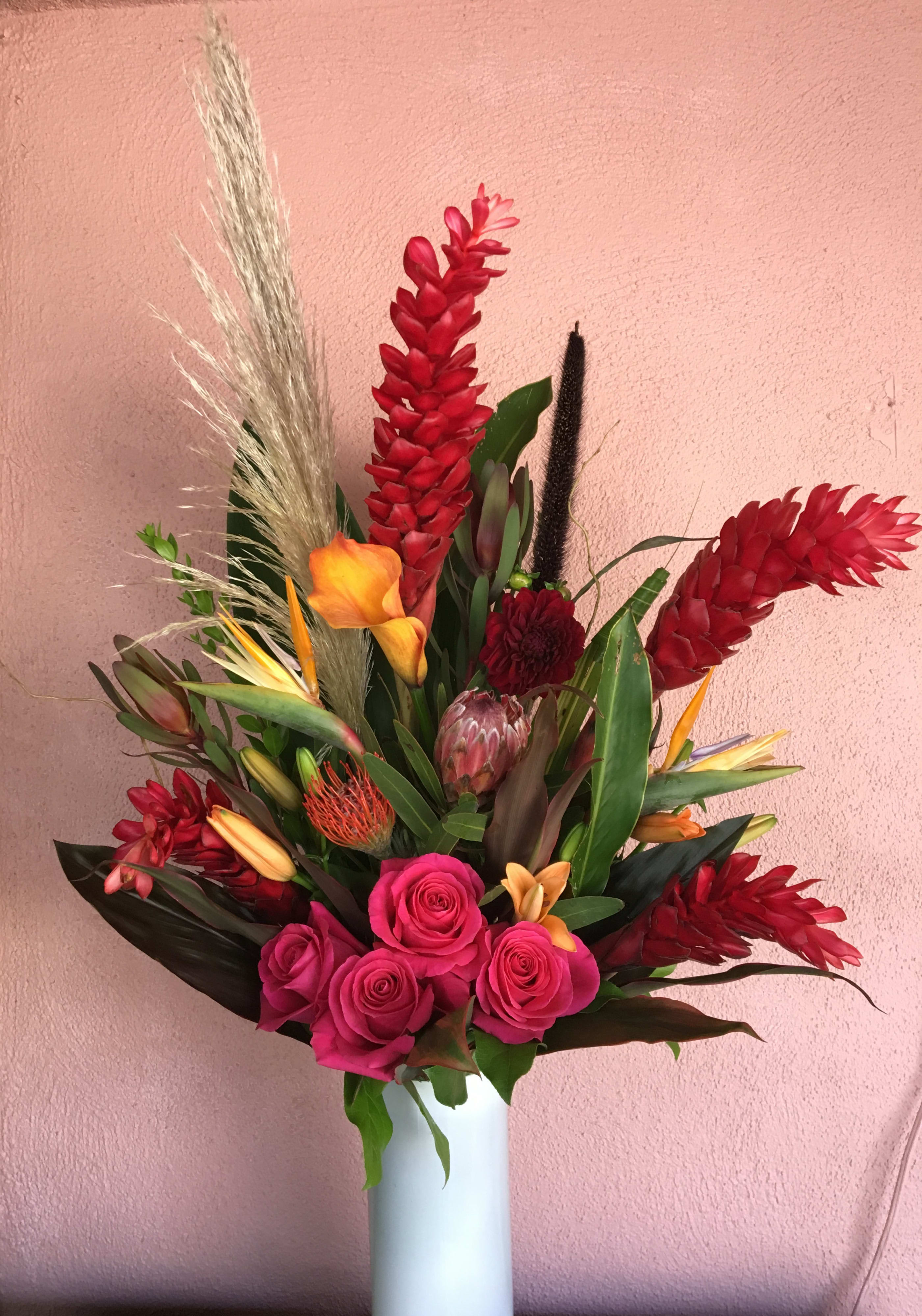 Tropic Love  - Beautiful tropical arrangement filled with ginger flower, proteas, orchids, pampas grass, and much more. 