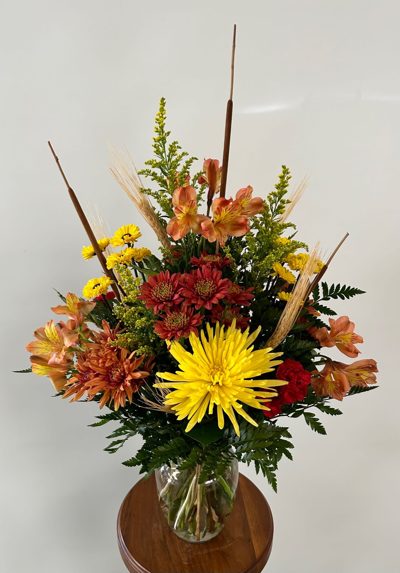 Autumn Daze Autumn Daze - Vased arrangement of autumn shades. This is an all-around arrangement.