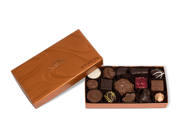 Rocky Mountain Chocolate 8.5 oz - A sweet way to show them you care, for any occasion!  Filled with 8.5 oz. of smooth buttercreams, meltaways, chewy caramels and nutty clusters all drenched in milk and dark chocolate and white confection.   Brimming with favorites such as our creamy Peanut Butter Pails™, signature pecan and caramel Bear™ and more, there is something for every chocolate lover in this assortment.