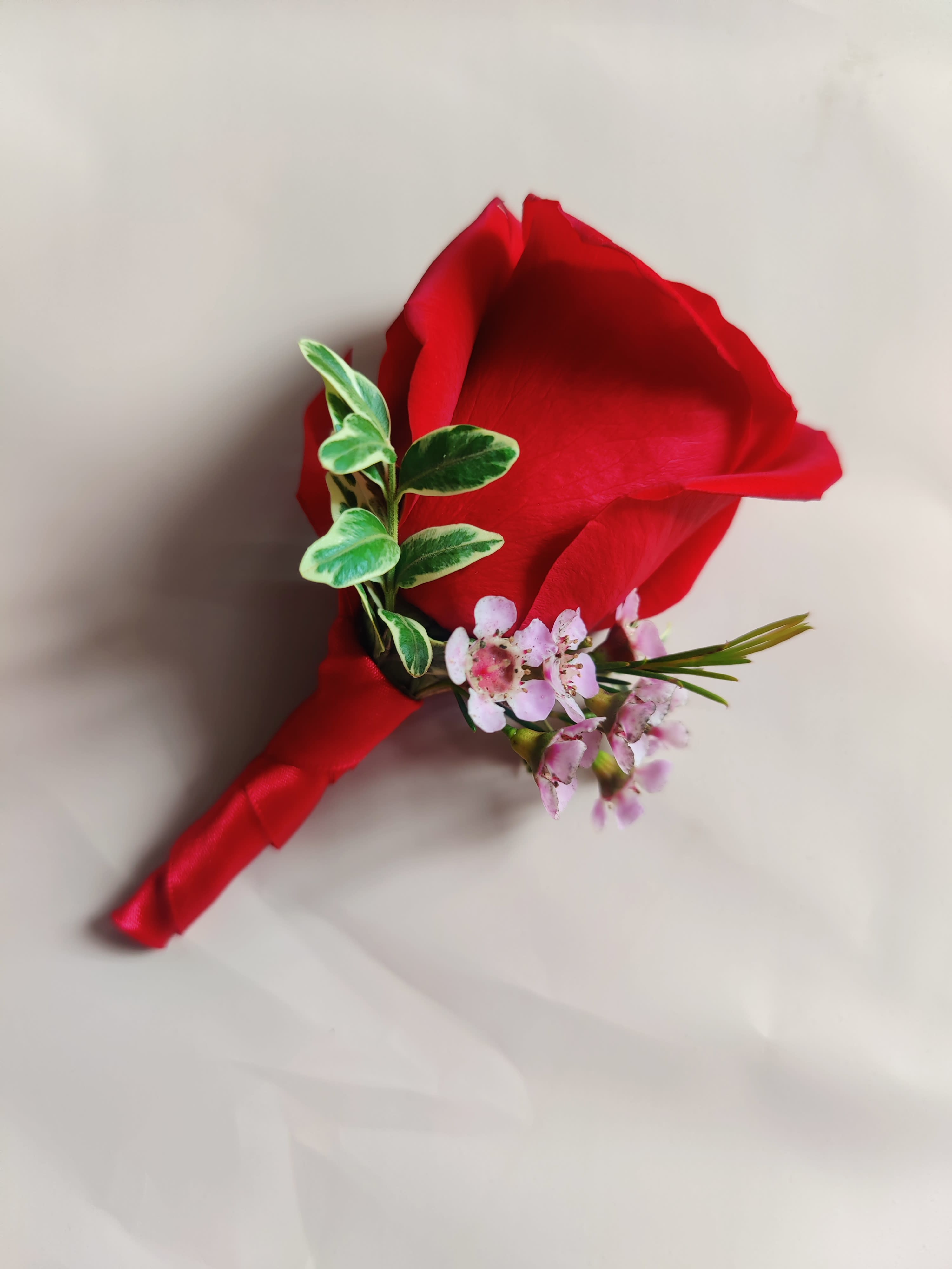 Red Rose Boutonniere in Costa Mesa, CA | Millan Flowers
