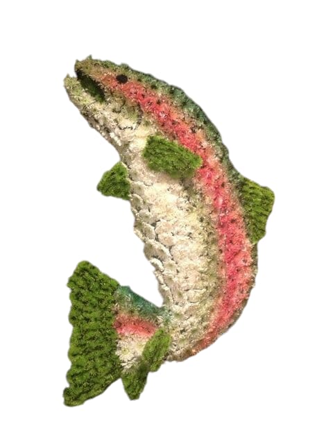FISH OF GREEN WHITE AND PIN FISH OF GREEN WHITE AND PIN - Description: A large fish made carnations and cushion mums and accented with a green ribbon is the perfect tribute for a loved one. Easel and shamrock total height and width is about 66" tall, 24" wide. Custom pieces take about 5 hours to create. In order to create beautiful pieces like this, please allow at least 24 hrs. for ordering.