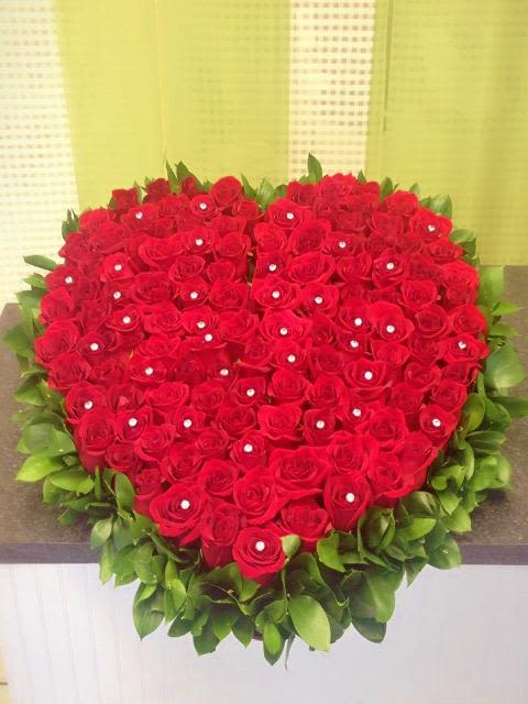 You have my Heart Flower Bouquet - Red Roses - You have my Heart Flower Bouquet: Roses artistically placed in a heart shape surrounded by greens. approx. size 18-20' width. between 90-100 roses.