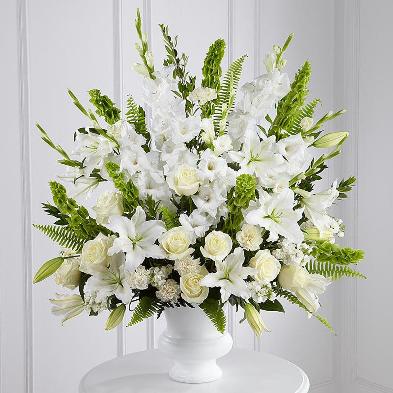 All White Sympathy Basket - All white sympathy basket made of Carnations, Roses and Glads.