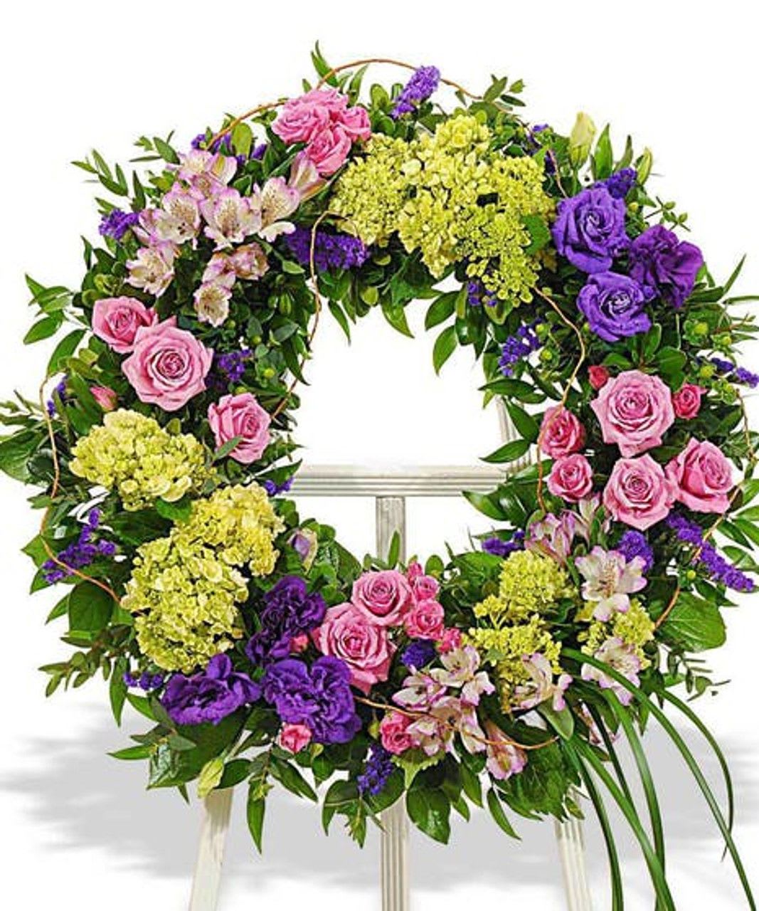 Mixed Pastels Wreath - Mixed pastel colored wreath made with beautiful seasonal flowers.