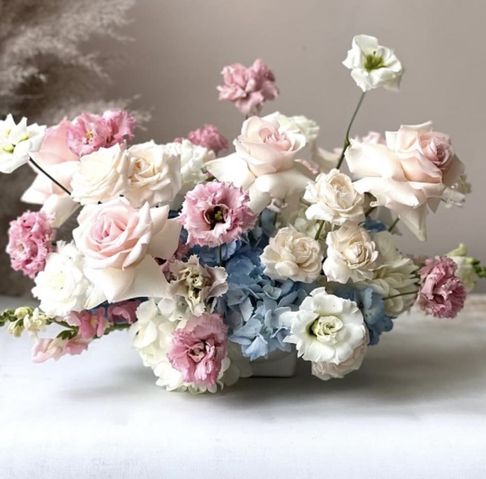 Eternal Romance Bouquet - As a floral designer, I take immense pleasure in crafting unique and elegant bouquets that transform any space into something extraordinary. My passion lies in revolutionizing the world of floristry by creating one-of-a-kind floral arrangements that stand out and captivate. For me, designing is not just a profession but a way to infuse beauty and sophistication into every environment, enhancing your brand’s image with distinctive floral artistry.  