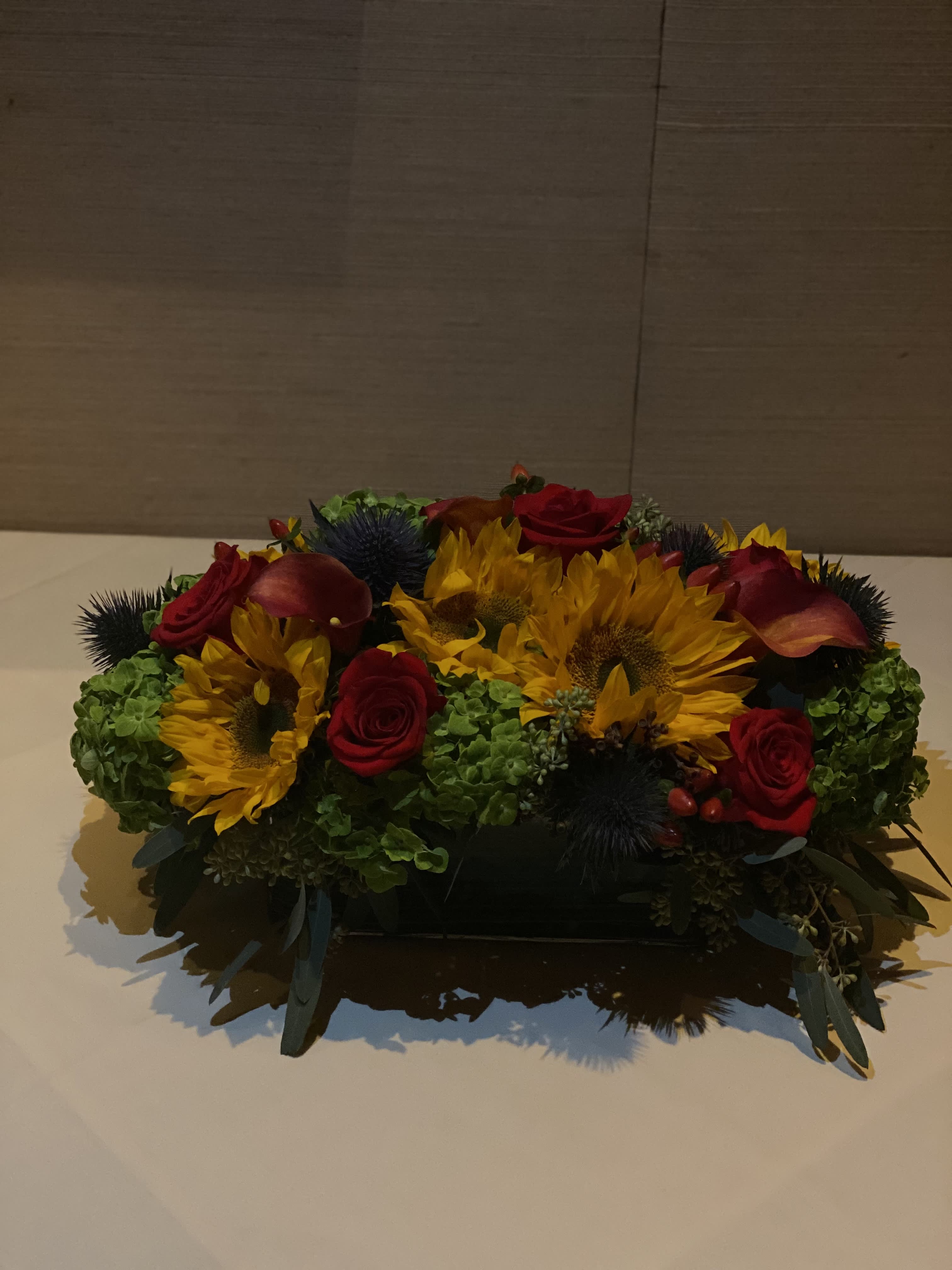 Sunrise  - Our sunrise arrangement is a great way to decorate a dinner party or to bring some color into any room! Perfect colors to use in either fall or summer. 