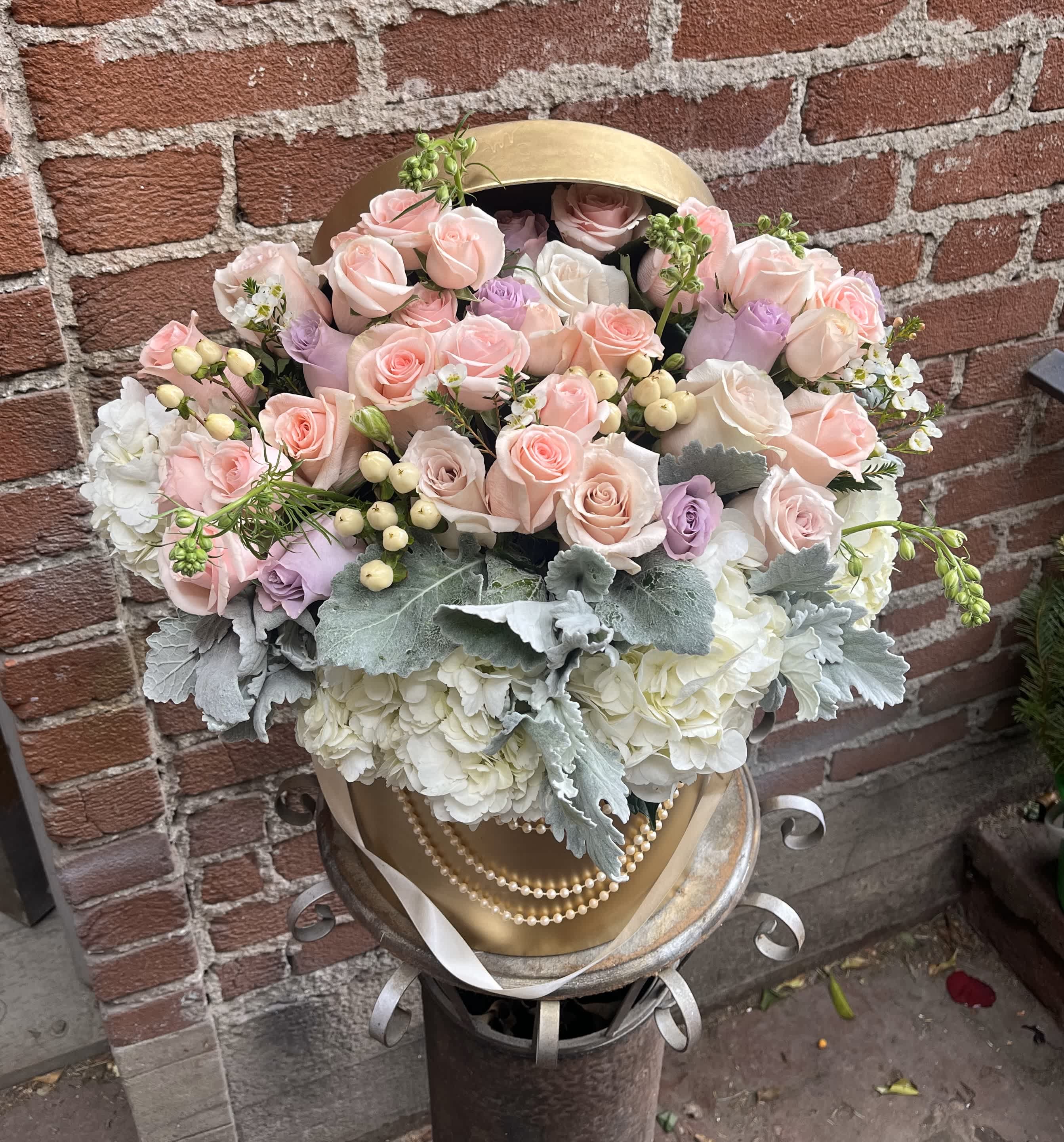 Pastels of Valentines - Studio City Florist -  Introducing our enchanting Pastels of Valentines Flower Arrangement, a celebration of love and tenderness in the most delicate hues. This curated ensemble combines the softest pastel shades to create a bouquet that speaks volumes about affection and warmth. Ideal for expressing your sentiments on Valentine's Day or any romantic occasion, this arrangement is a poetic symphony of colors.