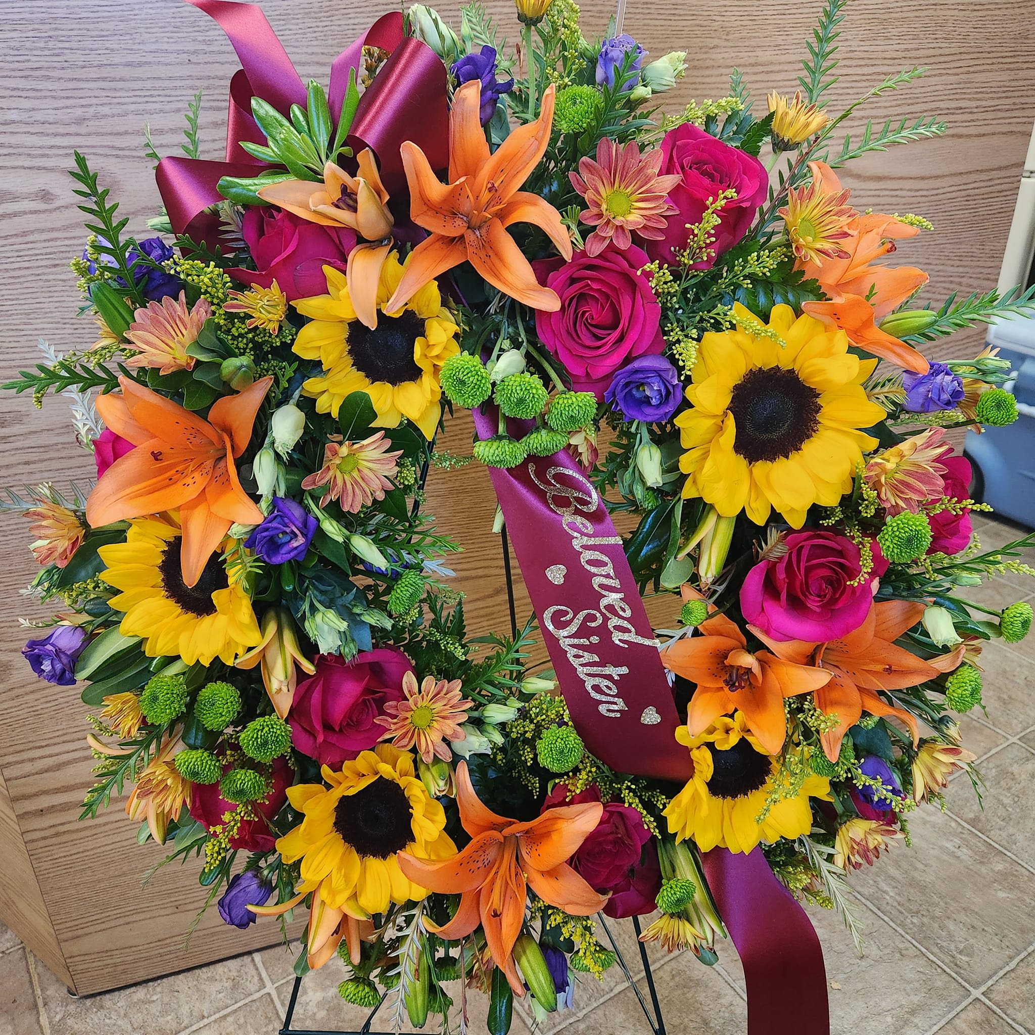 Open wreath easel Open wreath easel - Fresh flower wreath tribute can be made in any color with your choice of similar flowers.