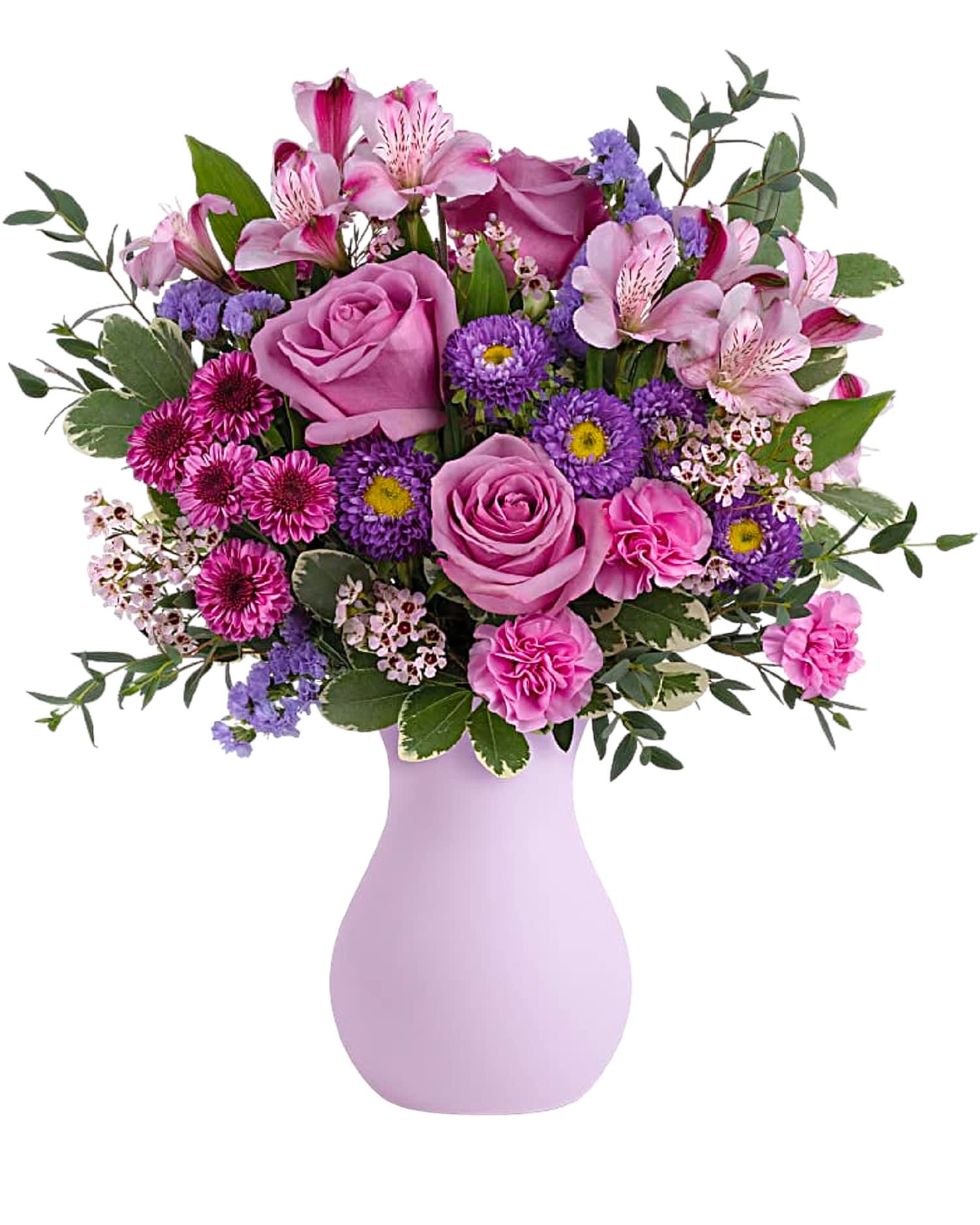Prettiest Purple Flower Arrangement - Pretty as a picture, this perfect purple arrangement spoils your someone special with lavender roses, and other complimentary flowers.   DETAILS Lavender roses, lavender alstroemeria, purple button spray chrysanthemums, purple Matsumoto asters, miniature lavender carnations, lavender waxflower, and lavender sinuata statice are arranged with parvifolia eucalyptus and variegated pittosporum.  VASE INCLUDED Orientation: All-Around Item #NF-154  FLORIST-TO-DOOR Same day flower delivery on most orders placed online by 12 pm or 10 am on weekends PST.  BLOOM DETAILS Roses Mini-Carnations Matsumoto Asters Alstroemeria Statice Filler Seasonal Filler Greenery  The Standard Arrangement is approx. 16 3/4&quot; H x 15 1/4&quot; W. The Deluxe Arrangement is approx. 16 3/4&quot; H x 15 3/4&quot; W. The Premium Arrangement is approx. 17 1/2&quot; H x 15 3/4&quot; W.  How to place an order? 1. You can place an order directly on this secure website OR 2. You can call in your order by dialing: (323) 262 - 9238 OR 3. You can visit our store (appointment recommended 323.262.9238)  NINFA'S FLOWERS 2405 WHITTIER BLVD. LOS ANGELES, CA. 90023  ATTENTION: *Please note that on busy holidays, Valentine's Day, and Mother's Day, we cannot verify if the recipient received the flowers until the following day. You can verify delivery on the website after 10:00 pm, call 323.262.9238 the following day after 10:00 am, or contact the recipient directly. Thank you for your patience and understanding.