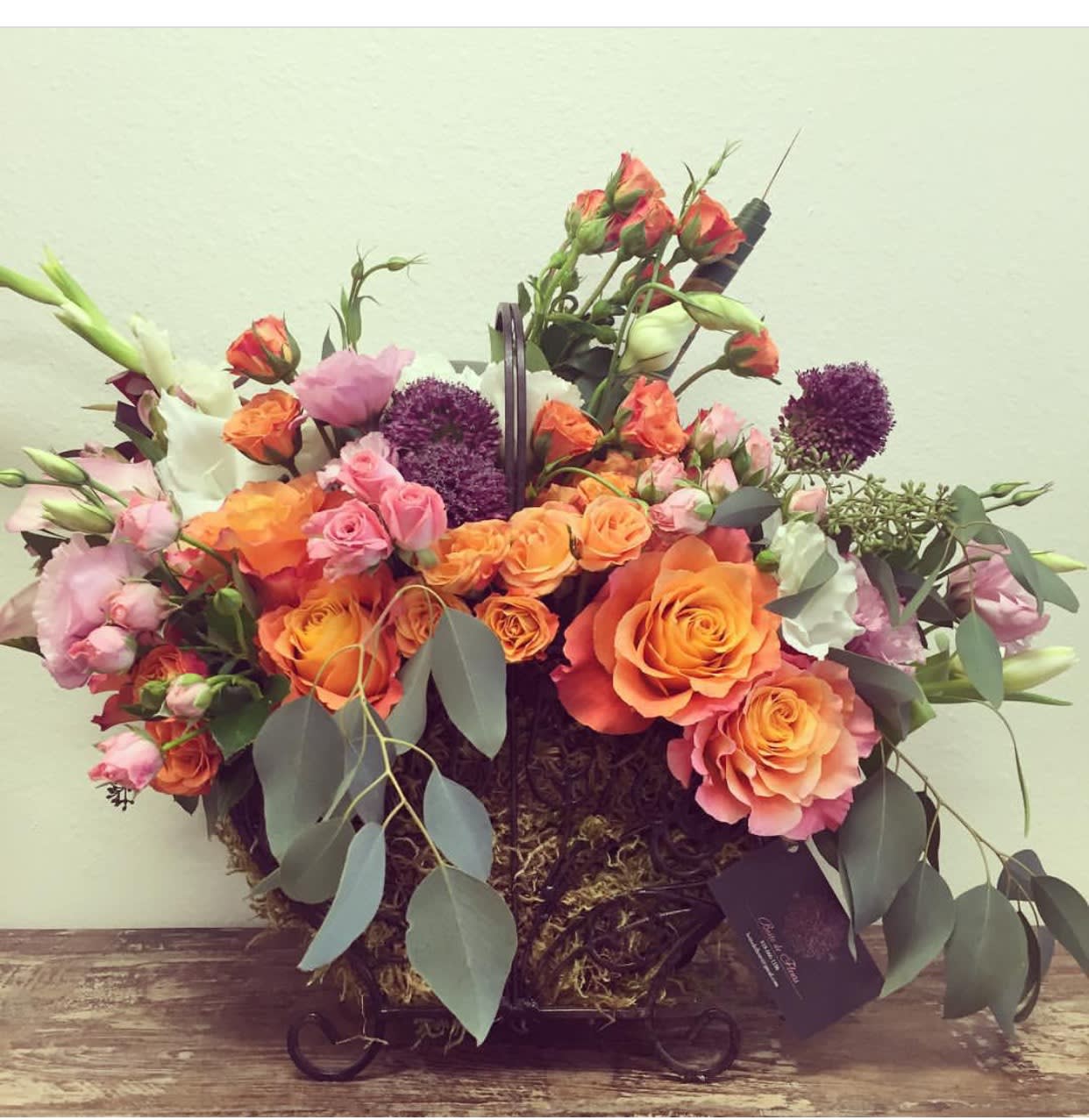 Fall garden Fall garden - collaboration of deep oranges and purples with a touch of greens and pinks arranged in a metal basket.