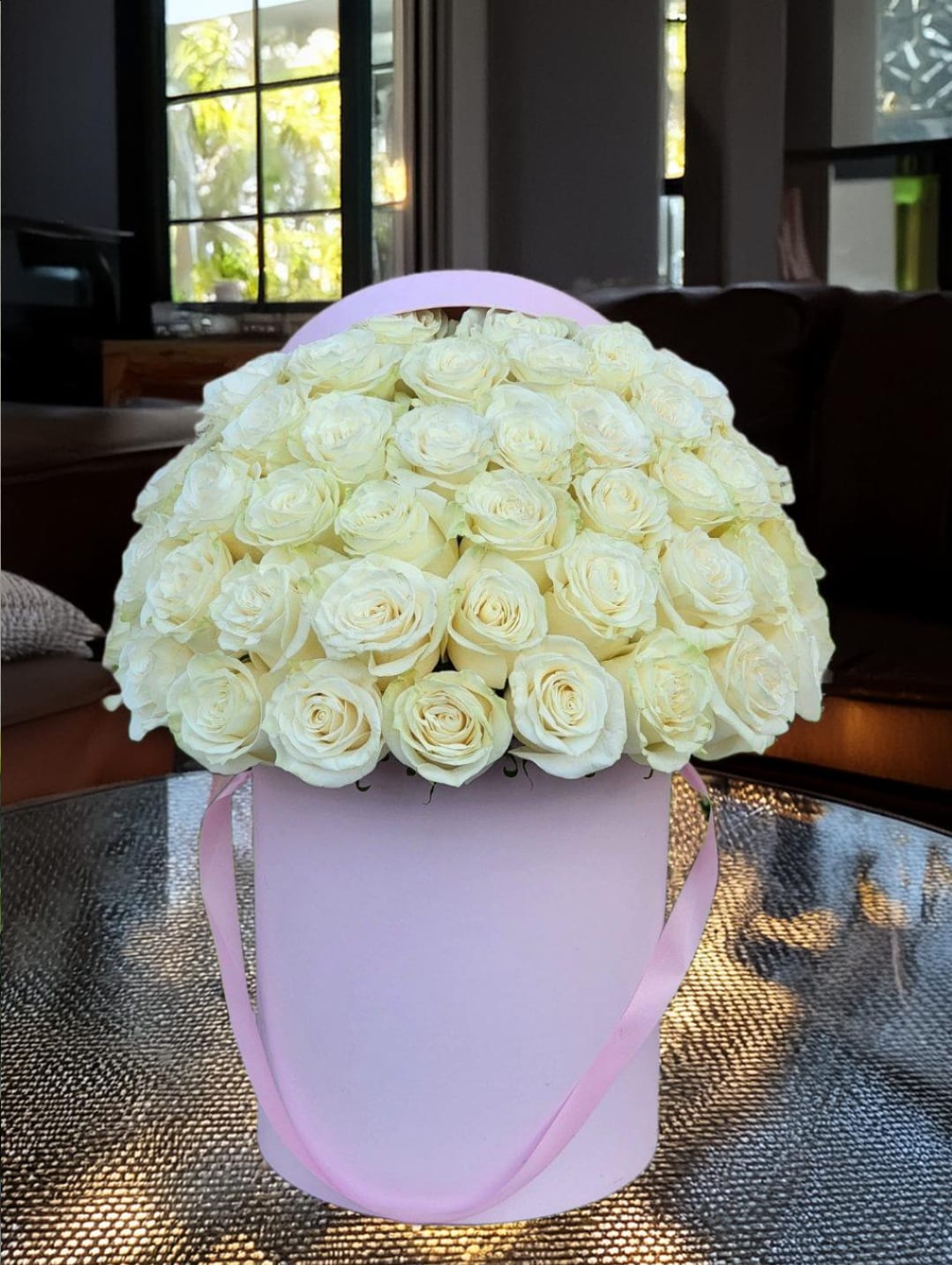 Icy White Blooms  - Indulge in luxury with our exquisite white roses elegantly presented in a hatbox. Perfect for any occasion, elevate your expression of love with something truly special.  RECOMMENDED FOR: Love and Romance, I Love You Flowers, Anniversary, Proposal,  Romantic Gift, Birthday, Get Well Soon, Celebrations, Best Wishes, Thank You, Congratulations, Just Because, New Baby, Everyday 