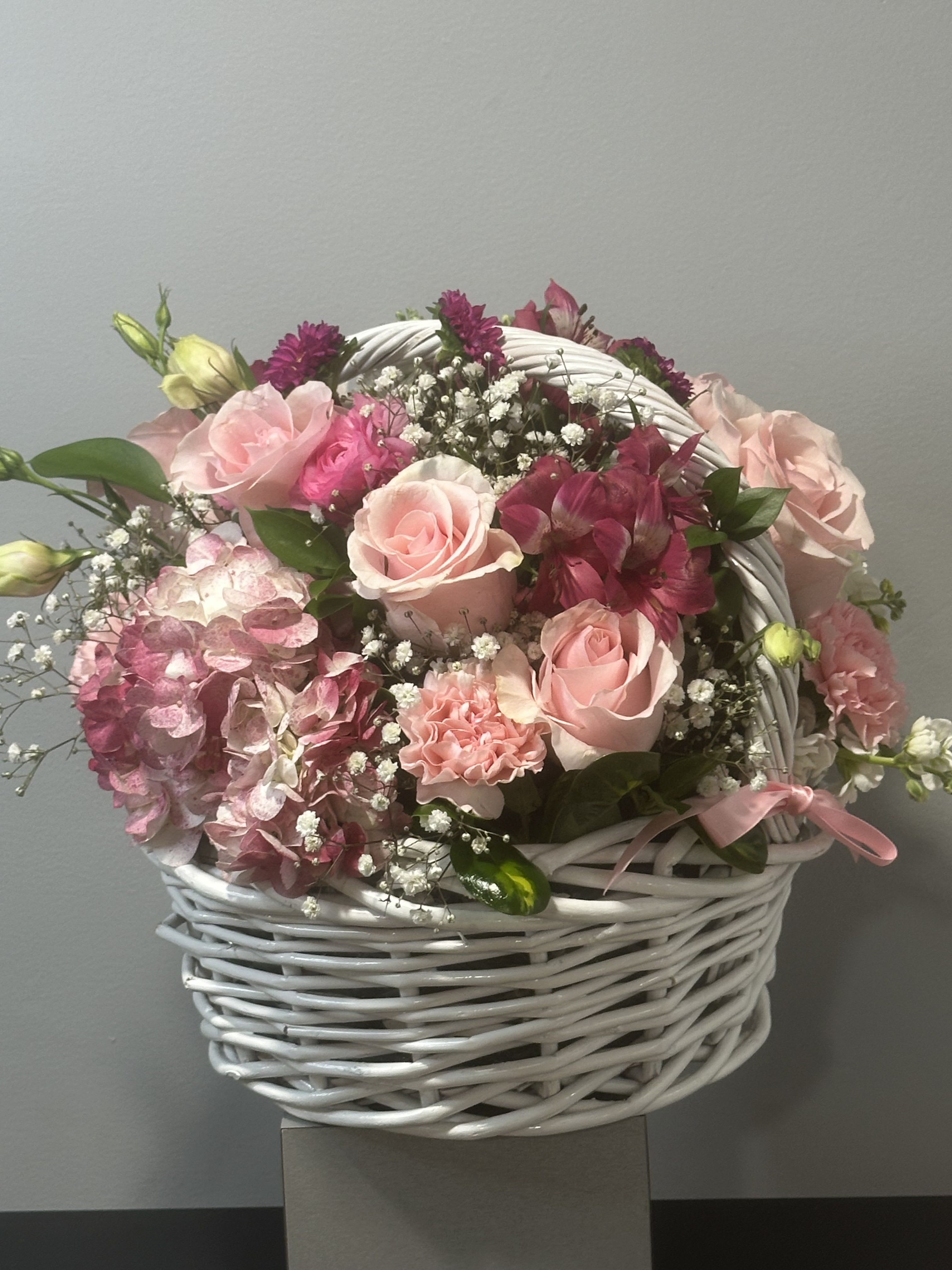 Sending Joy by Petals 2 Go Sending Joy by Petals 2 Go - This basket of pink petals is sure to get a warm welcome!