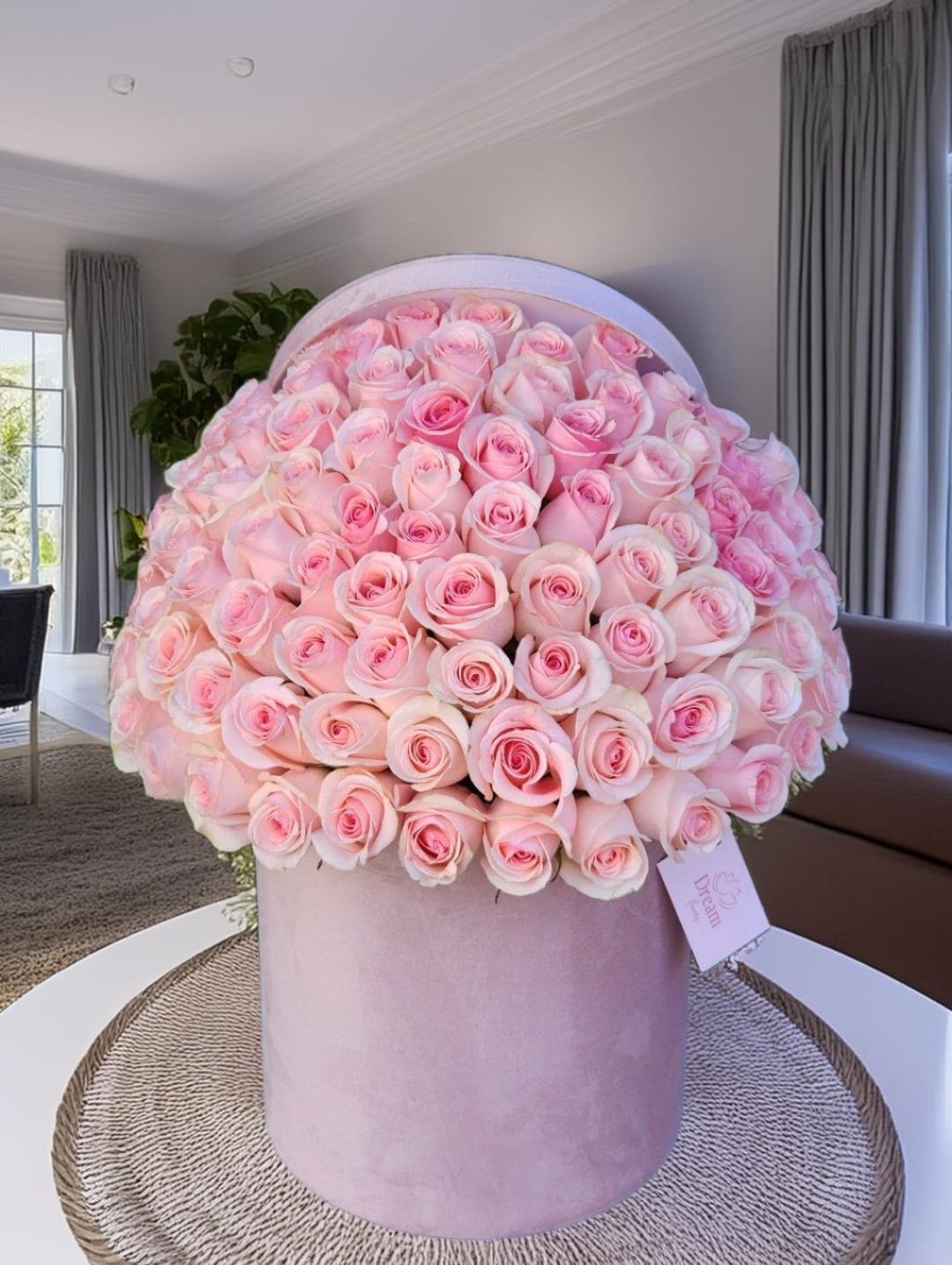 Rosy Affection - Fresh pink roses arranged in a hatbox exude elegance and charm. The delicate petals the unique presentation in a hatbox create a stunning visual appeal, evoking feelings of romance and sophistication.  RECOMMENDED FOR:  Love and Romance, I Love You Flowers, Anniversary, Proposal,  Romantic Gift, Birthday, Get Well Soon, Celebrations, Best Wishes, Thank You, Congratulations, Just Because, New Baby, Everyday