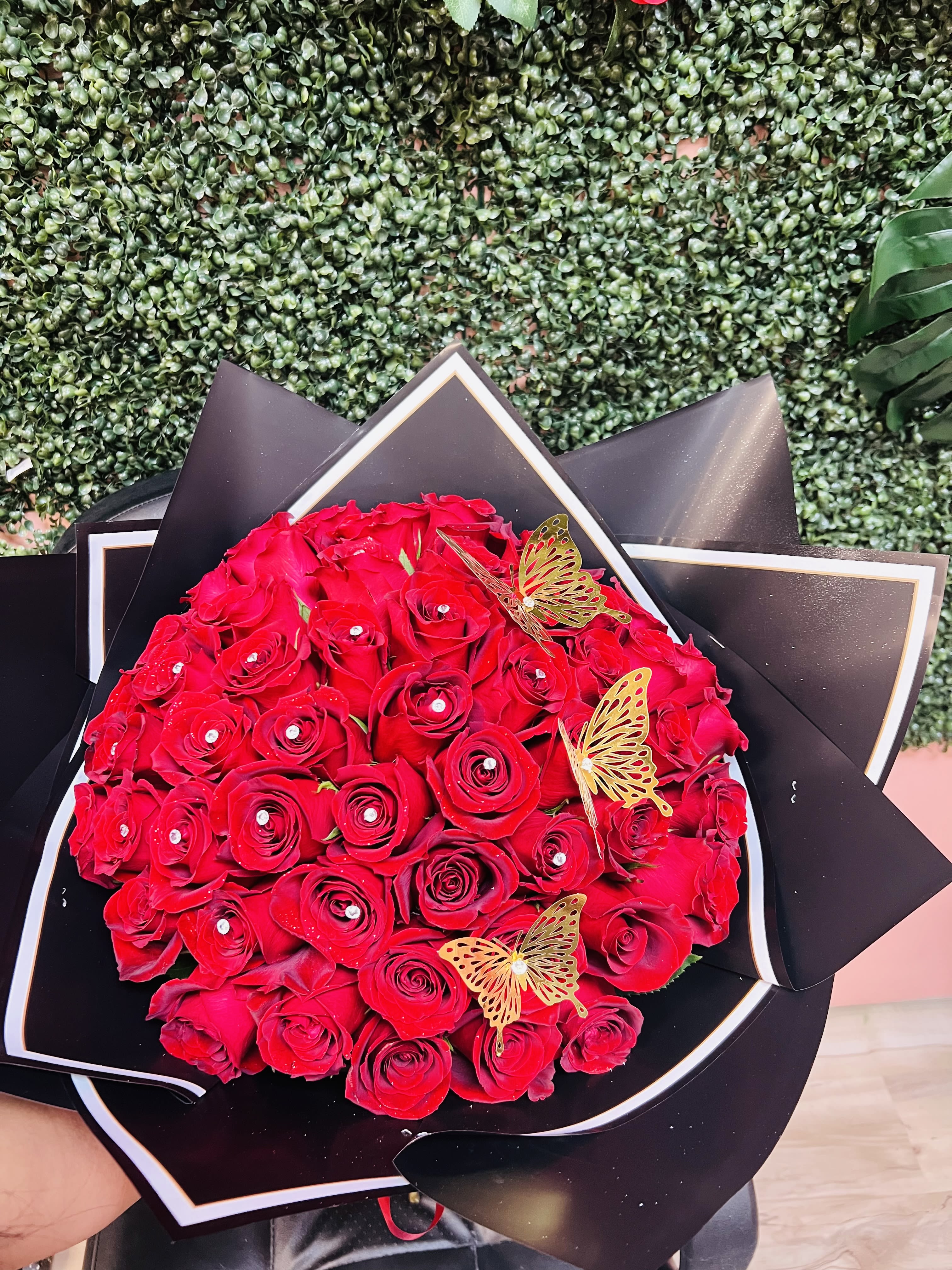 50 Rose Bouquet 50 Rose Bouquet - 50 red roses (wrapped in paper)