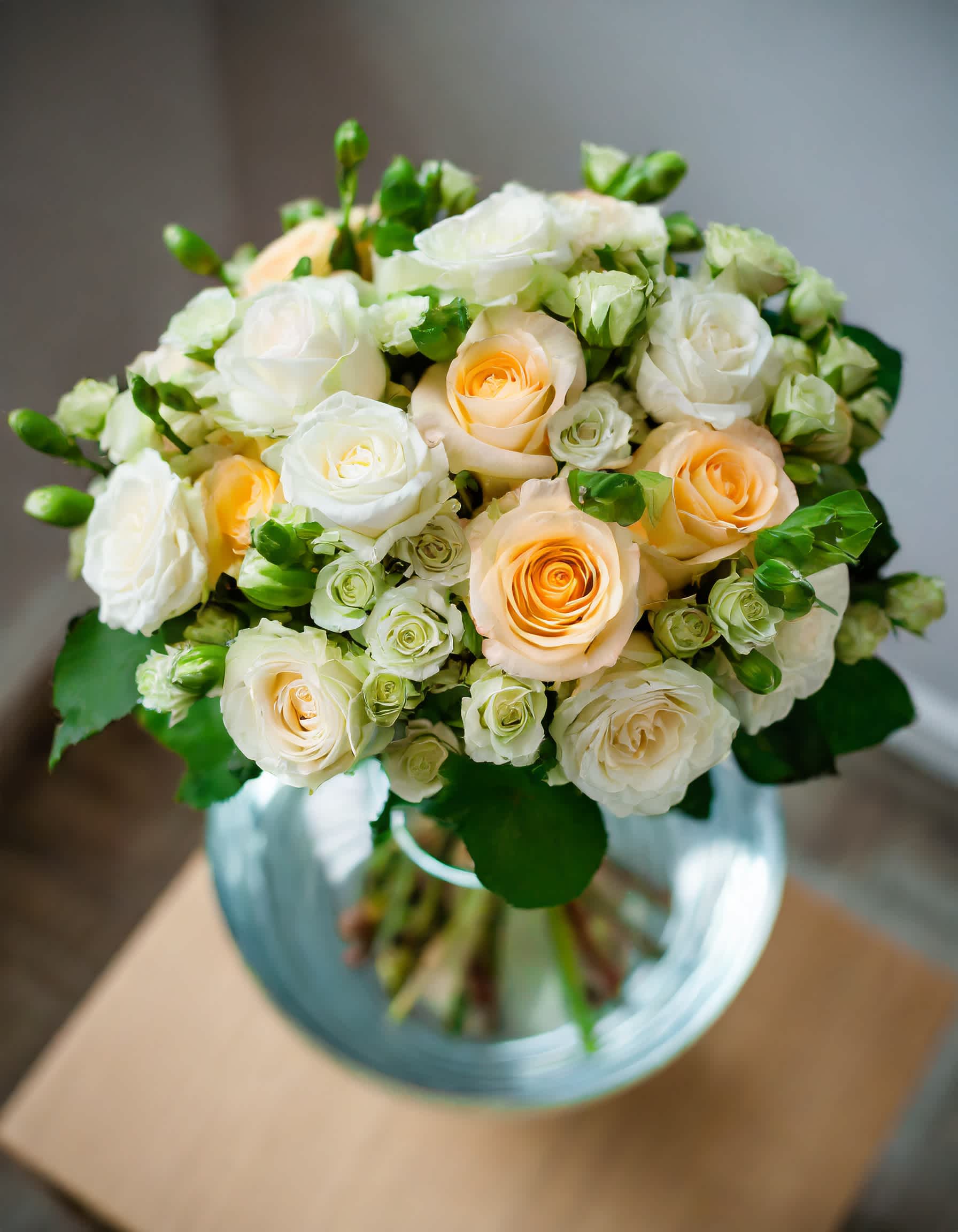 You Took My Love - A charming and beautiful bouquet featuring ivory roses, cream spray roses, and an assortment of mixed flowers, elegantly presented in a clear vase.  ALL IMAGES PROVIDED AT STANDARD PRICE  Recommended for: Love and Romance, I Love You Flowers, Anniversary, Proposal,  Romantic Gift, Birthday, Get Well Soon, Celebrations, Best Wishes, Thank You, Congratulations, Just Because, New Baby, Everyday, Sympathy