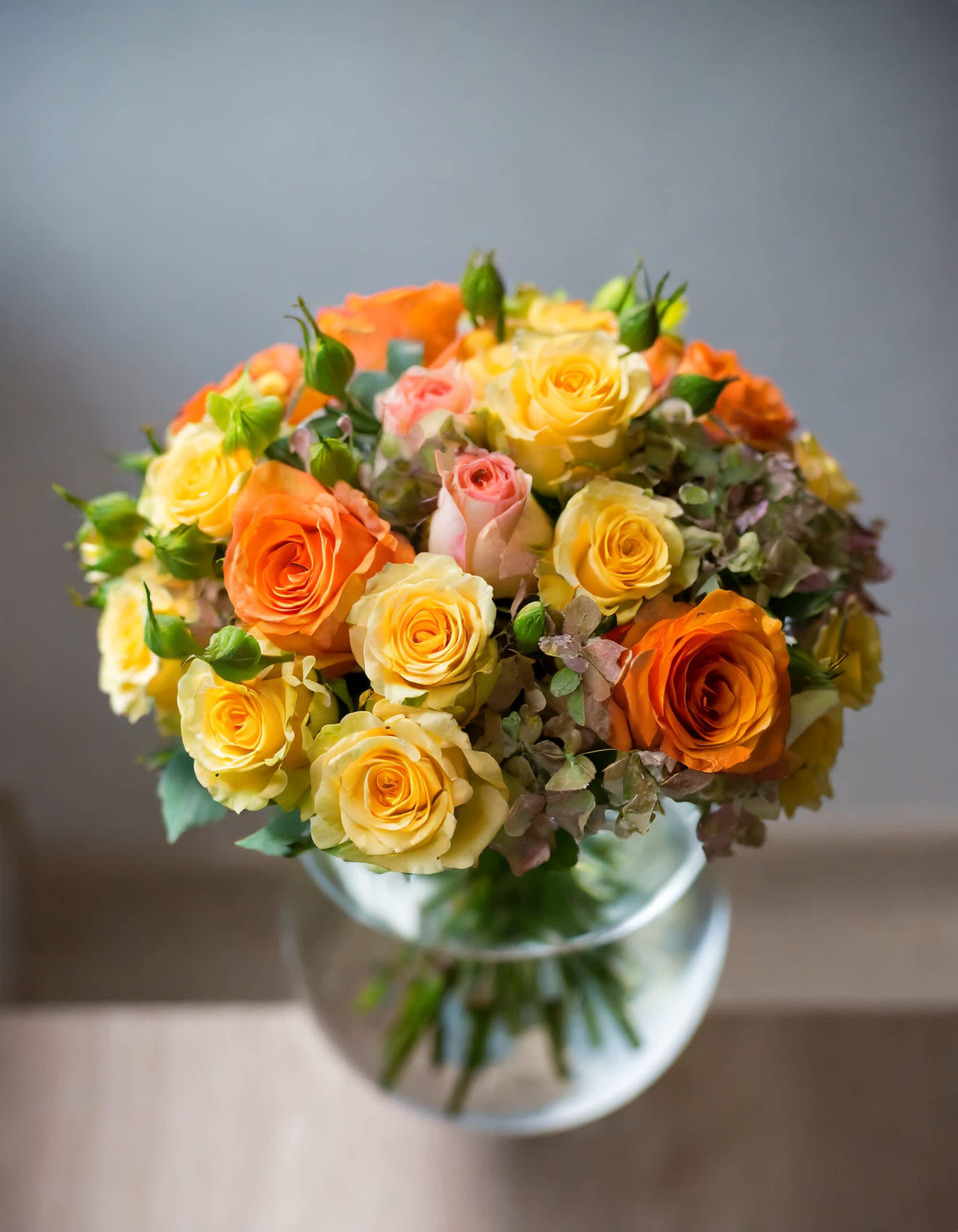 A Summer Twilight - The bouquet is adorned with the elegance of roses and a lively assortment of mixed flowers, radiating a vibrant and sunny charm. It's a celebration of brightness and joy captured in a stunning floral arrangement.  Disclaimer: ALL IMAGES PROVIDED AT DELUXE PRICE  Recommended for: Love and Romance, I Love You Flowers, Anniversary, Proposal,  Romantic Gift, Birthday, Get Well Soon, Celebrations, Best Wishes, Thank You, Congratulations, Just Because, New Baby, Everyday