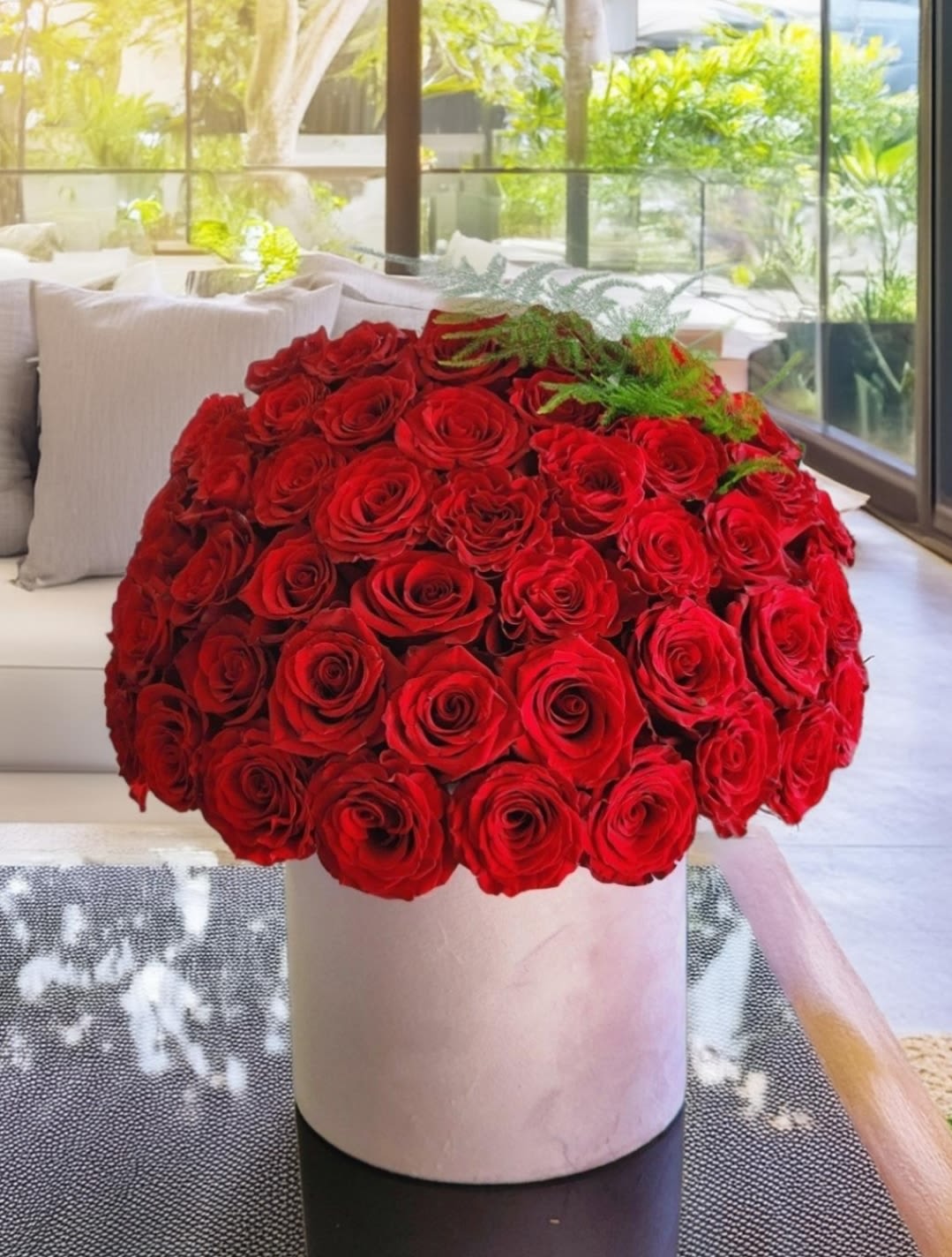 Wild at Heart - Our luxurious hatbox filled with stunning red roses is the perfect romantic gift. The vibrant red roses contrast beautifully with the sleek hatbox, creating an elegant and sophisticated arrangement that will leave a lasting impression