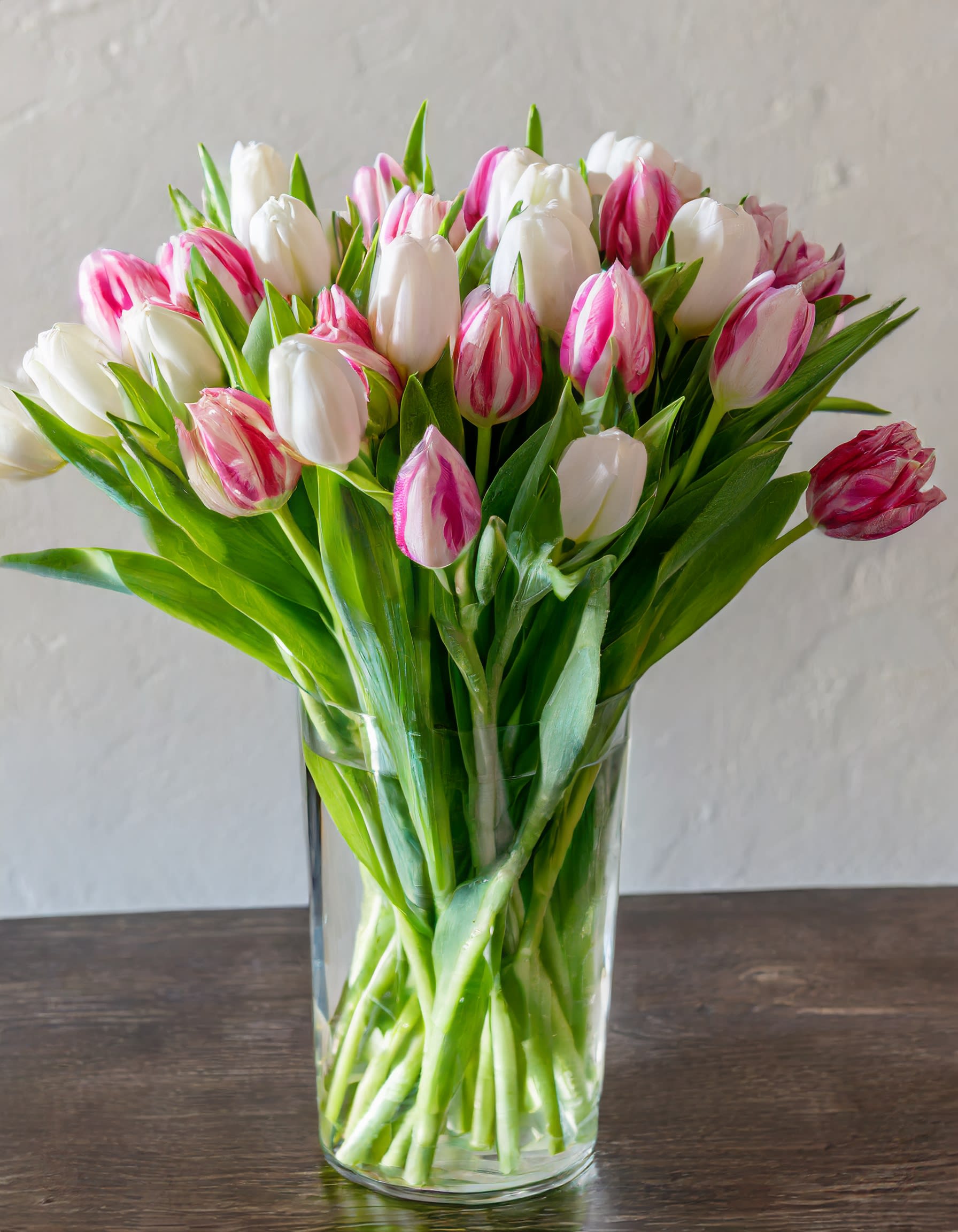 The Delicate Tulips The Delicate Tulips - If you want to express your most tender feelings, then, by the way, a bouquet of white, pink tulips is perfect, because white buds, opening, say: Look into my heart.Becoming the personification of her bright hopes and pure heart. Disclaimer: ALL IMAGES PROVIDED AT DELUXE PRICE