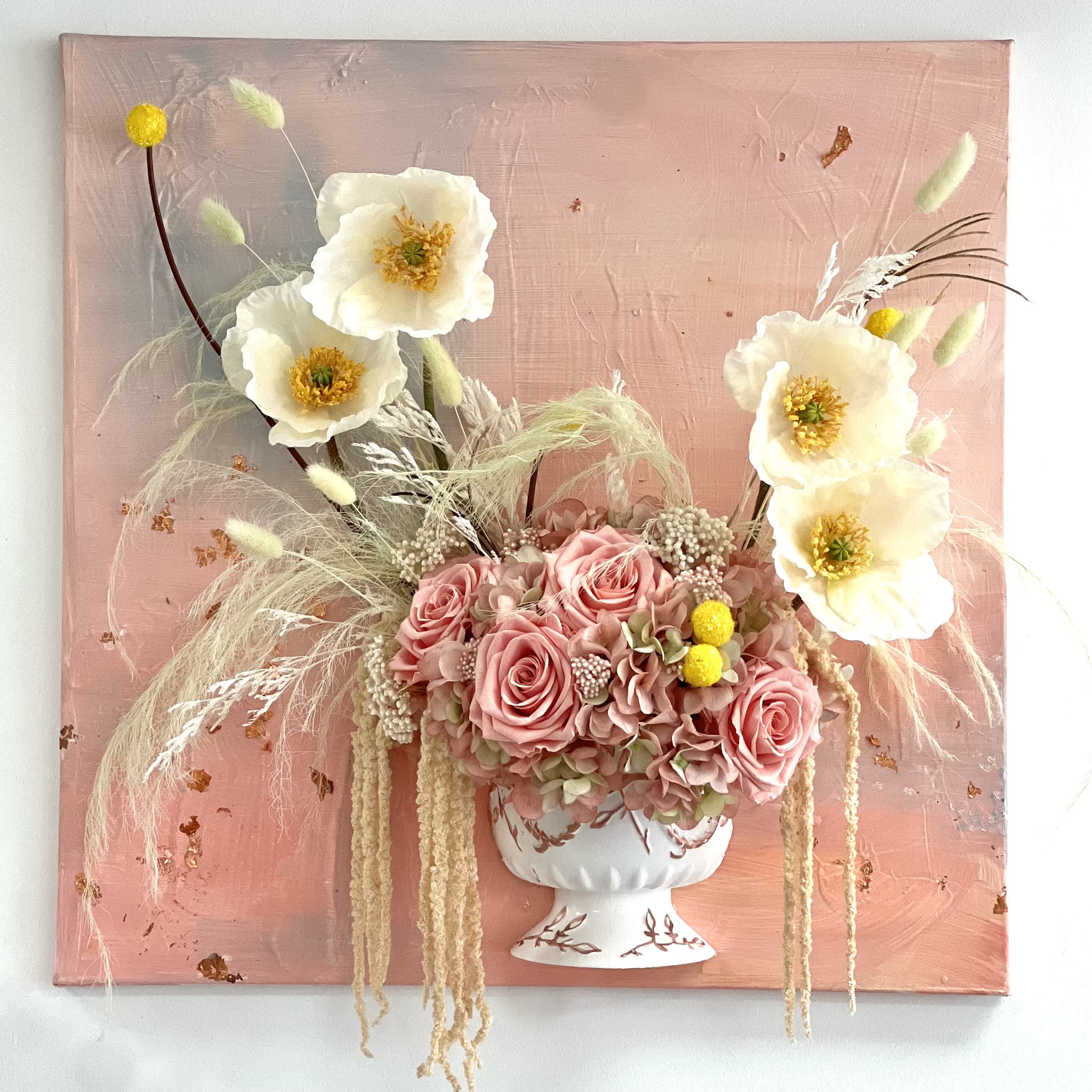 Eternal Blooms Canvas: Eternal Flowers Eternal Blooms Canvas: Eternal Flowers - Step into a world of everlasting beauty with our Eternal Blooms 3-Dimensional Floral Canvas Art. This exquisite piece showcases a masterfully painted vase adorned with lifelike silk hydrangea, intricate silk roses, vibrant silk poppy flowers, and an array of other elements meticulously arranged to create a captivating 3-D effect. Crafted to last a lifetime, this stunning art piece serves as a timeless celebration of nature's splendor, infusing any space with an enduring sense of elegance and grace. Embrace the allure of everlasting blooms with this artful creation, destined to be cherished for generations to come.