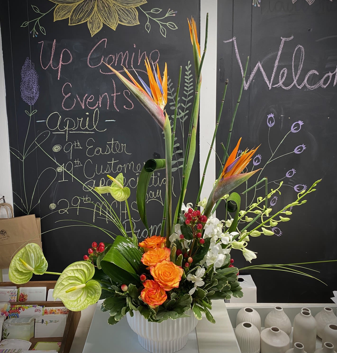 Tropical Treasures - Say &quot;WOW&quot; with the best of the tropics: birds of paradise, anthurium, hypericum berries, and dendrobium orchids.