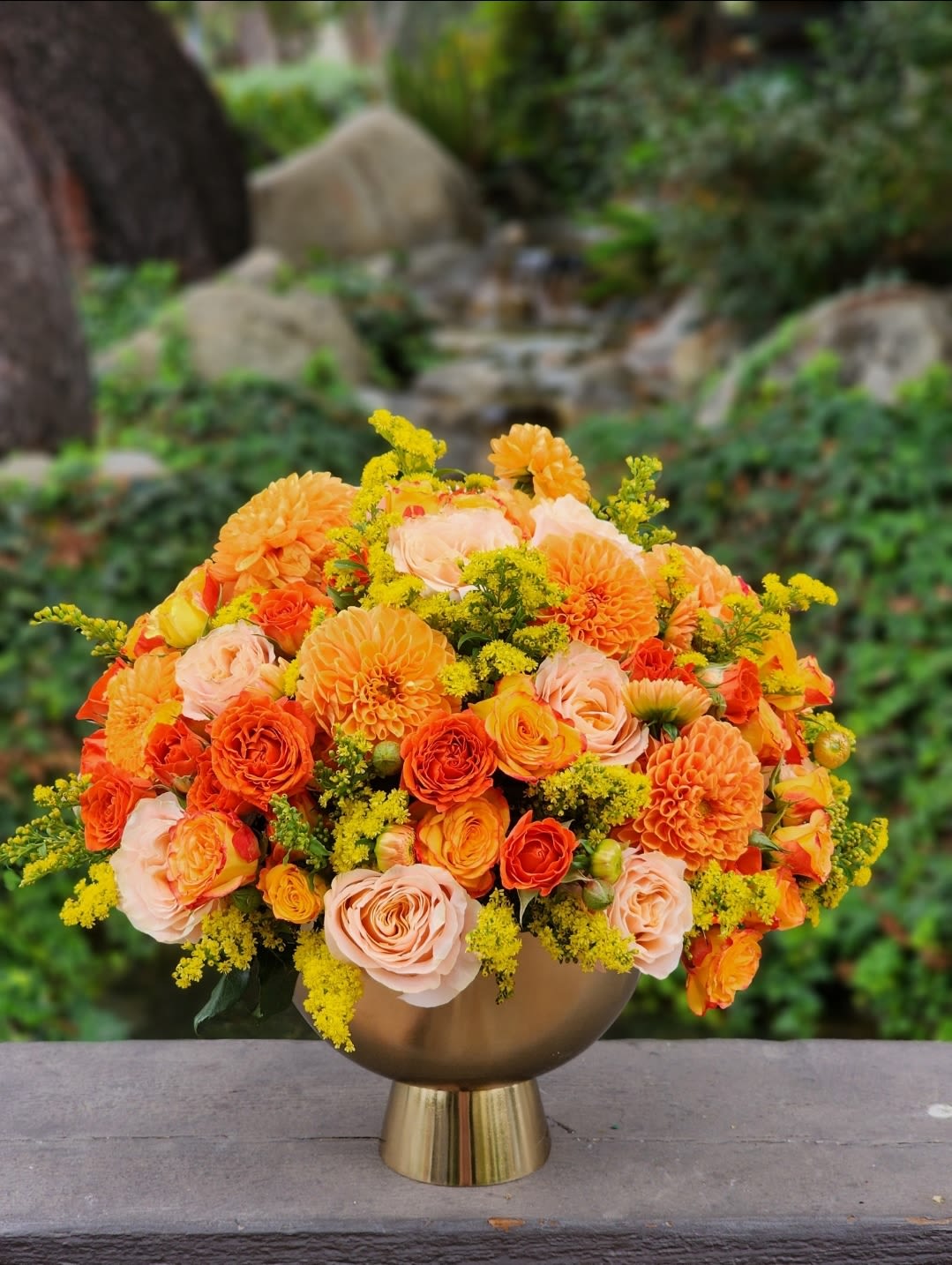 Fall Delights - Celebrate autumn with this vibrant arrangement of orange dahlias, roses, and yellow solidago. Perfect for adding warmth and elegance to any space, this bouquet captures the essence of fall. Brighten your home or gift it to someone special!