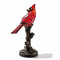 Cardinal Tiffany Accent Lamp - This tiffany cardinal accent lamp has 95 pieces of dark red glass. Stands 13.5 &quot; in Height. Bronze color resin base with branch and rose design. Deluxe and Premium versions come with wreath of fresh flowers. Special card reads: This lamp has been specially selected by(names of senders) to honor the memory of (Deceased) Each time you light this lamp may you recall the many wonderful occasions that you have shared together and their light continues to shine and touch your life. With Deepest Sympathy 