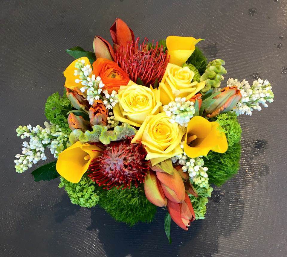 yellows and oranges - Spring is in the air with this arrangement.