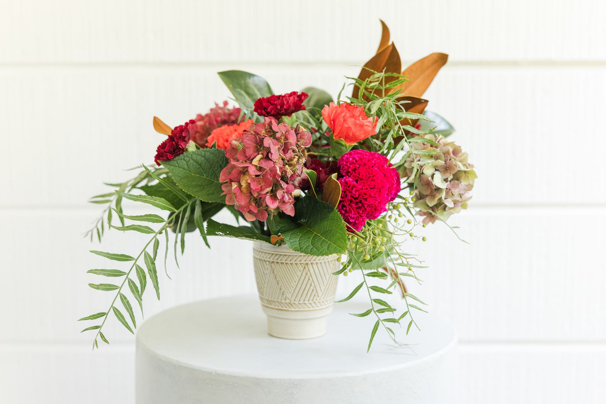 holiday cheer creation - Red Hydrangeas, Roses, Peper Bery, Holiday Greens, Magnolia