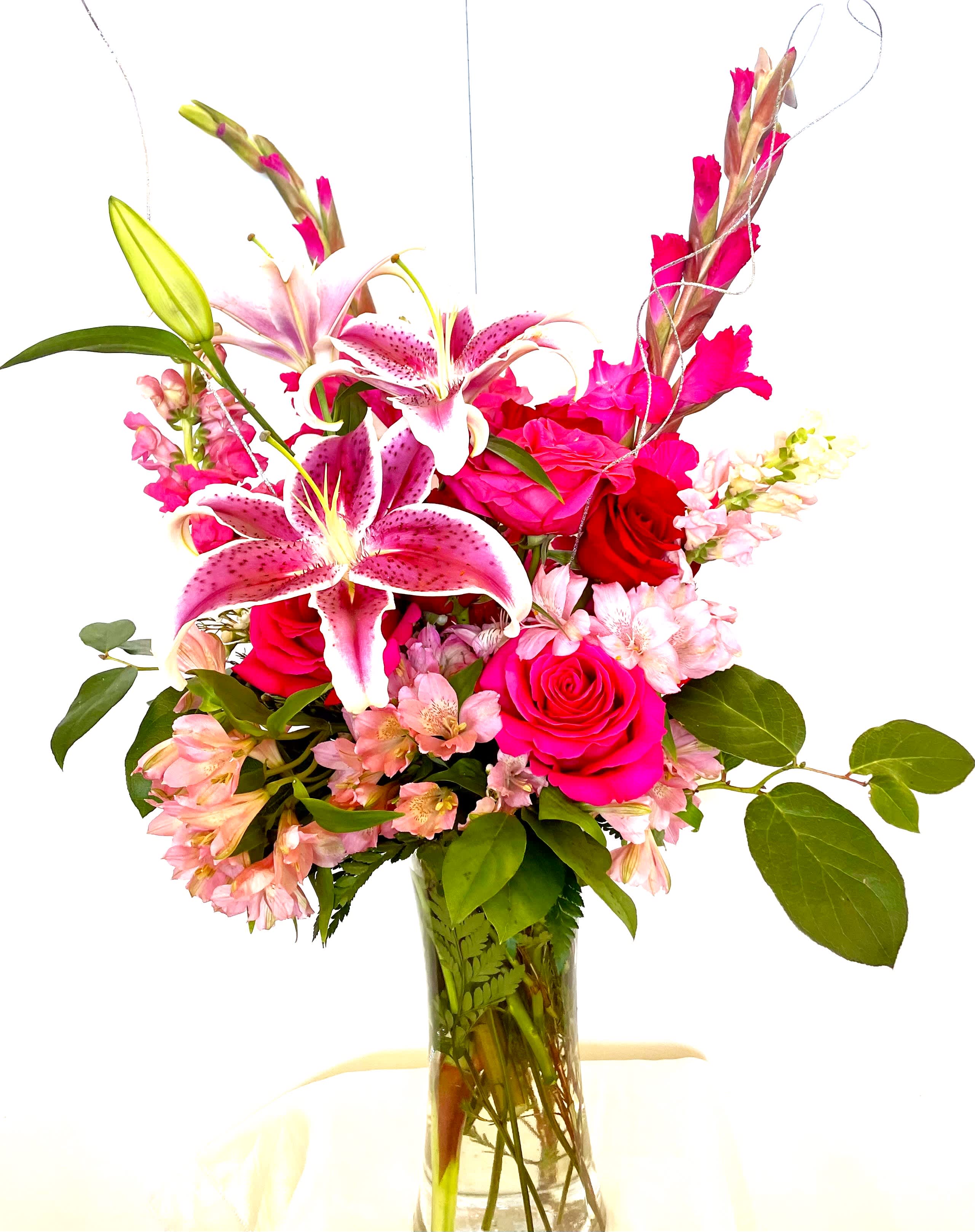 Love Hot Love! - Stunning and bright, lovely arrangement that is colorful, grand and dramatic. Send that special someone a great big bunch of love! 