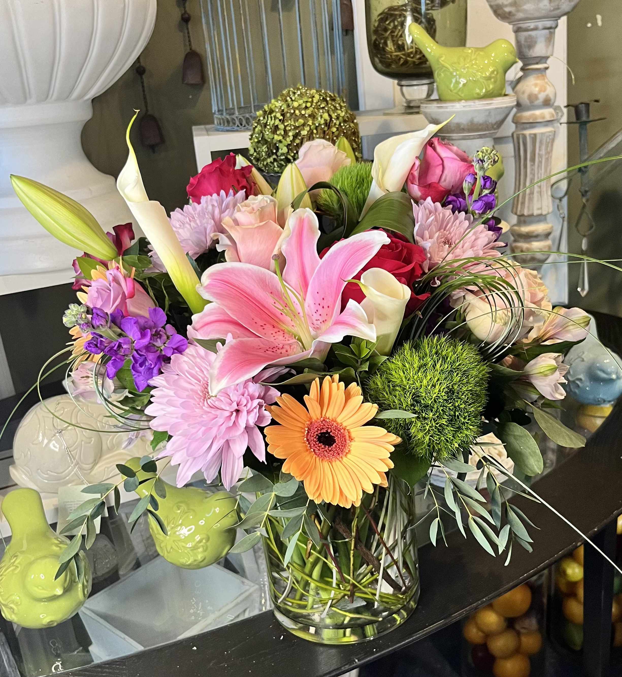 Spring Bouquet - A mix of seasonal flowers make this beautiful arrangement including lilies, mums, roses, stock, gerbera plus more 
