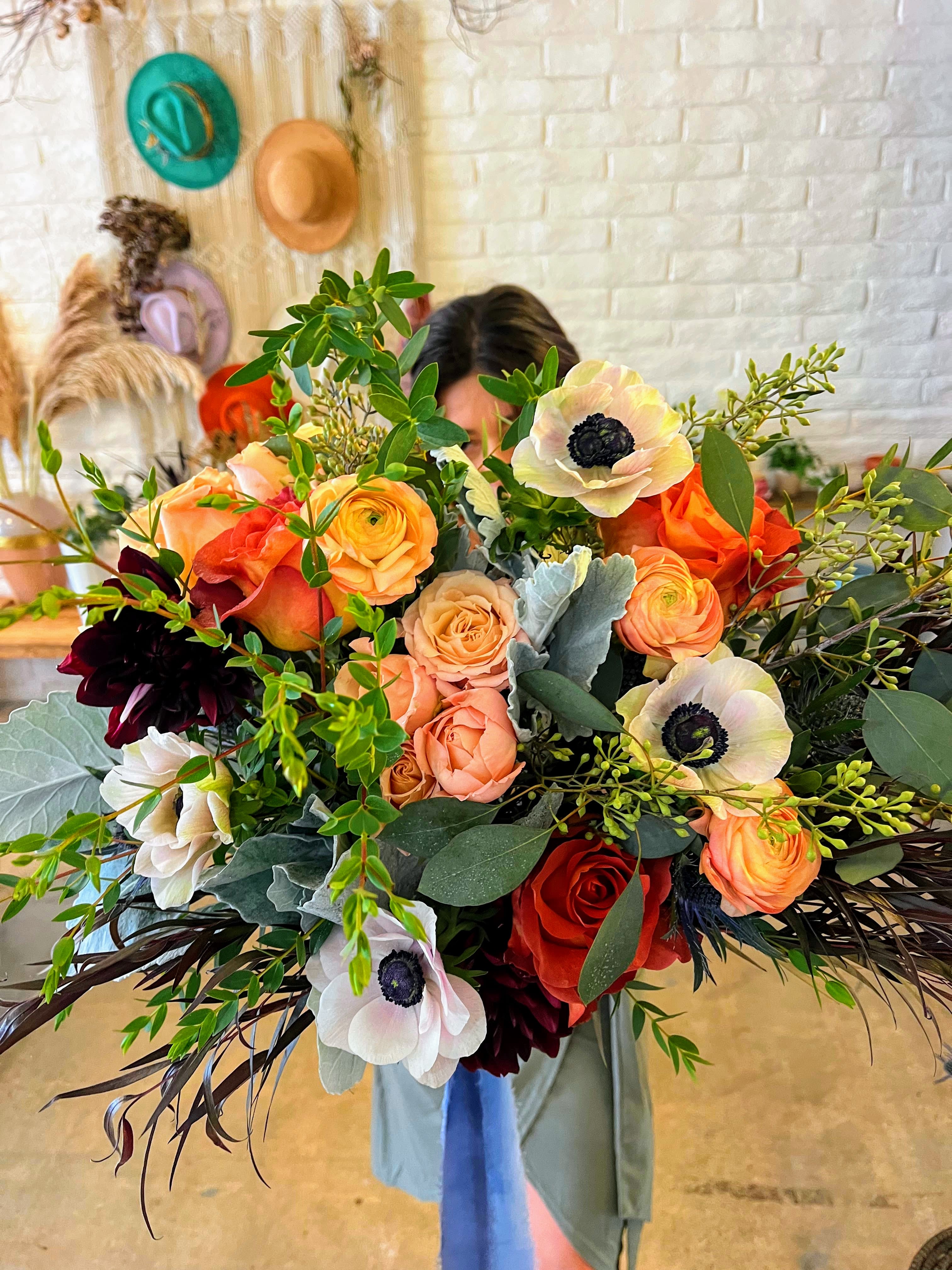 Autumn Designers Choice Autumn Designers Choice - This stunning Autumn Bouquet is a designer's choice creation, featuring a vibrant array of seasonal blooms in rich fall colors. Expect deep oranges, burgundies, and warm yellows, complemented by textured foliage and natural elements like pinecones or berries. Each bouquet is uniquely crafted to capture the essence of autumn, evoking the cozy charm of the season. Perfect for any occasion, it brings the beauty of fall indoors.