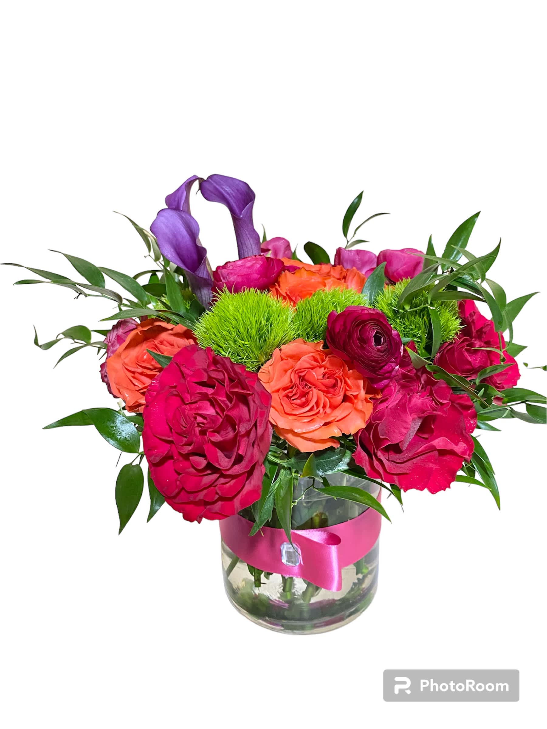 Orange Crash  - Pink, and orange roses come together with green hydrangea for a bright cube of sunshine. This arrangement lights up any space and will improve anybody's day. A perfect gift for all occasions.   APPROXIMATE DIMENSIONS 10&quot; W X 11&quot; H 