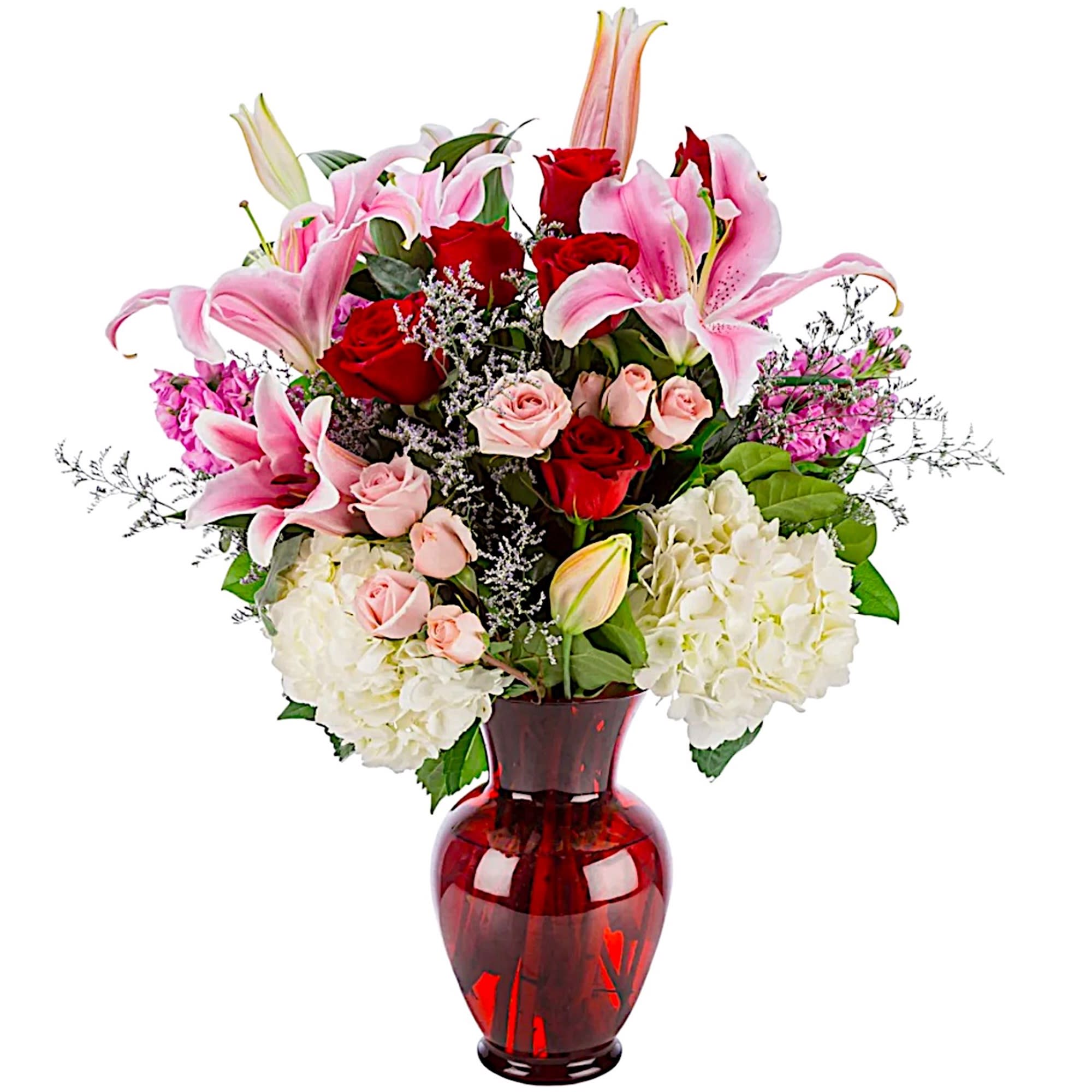 Sweetness Flower Arrangement - This classic arrangement is a perfect way to celebrate and show your love. Whether it be Valentine's Day, Mother's Day, a Birthday, a Holiday, or an Anniversary, this arrangement will be sure to wow.  DETAILS Red roses, blush spray roses, oriental lilies, magenta stock, white hydrangeas, seasonal filler, greenery.   VASE INCLUDED Orientation: All-Around Item #NF-305  FLORIST-TO-DOOR Same day flower delivery on most orders placed online by 12 pm or 10 am on weekends PST.  BLOOM DETAILS Roses Spray Roses Stargazer Lilies Stock Hydrangeas Seasonal Filler Greenery  The Standard Arrangement is approx.20&quot; W x 25&quot; H. (SHOWN - 6 Red Roses) The Deluxe Arrangement is approx. 20.5&quot; W x 25.5&quot; H. (12 Red Roses) The Premium Arrangement is approx. 21&quot; W x 26&quot; H. (18 Red Roses)  How to place an order? 1. You can place an order directly on this secure website OR 2. You can call in your order by dialing: (323) 262 - 9238 OR 3. You can visit our store (appointment recommended 323.262.9238)  NINFA'S FLOWERS 2405 WHITTIER BLVD. LOS ANGELES, CA. 90023  ATTENTION: *Please note that on busy holidays, Valentine's Day, and Mother's Day, we cannot verify if the recipient received the flowers until the following day. You can verify delivery on the website after 10:00 pm, call 323.262.9238 the following day after 10:00 am, or contact the recipient directly. Thank you for your patience and understanding.