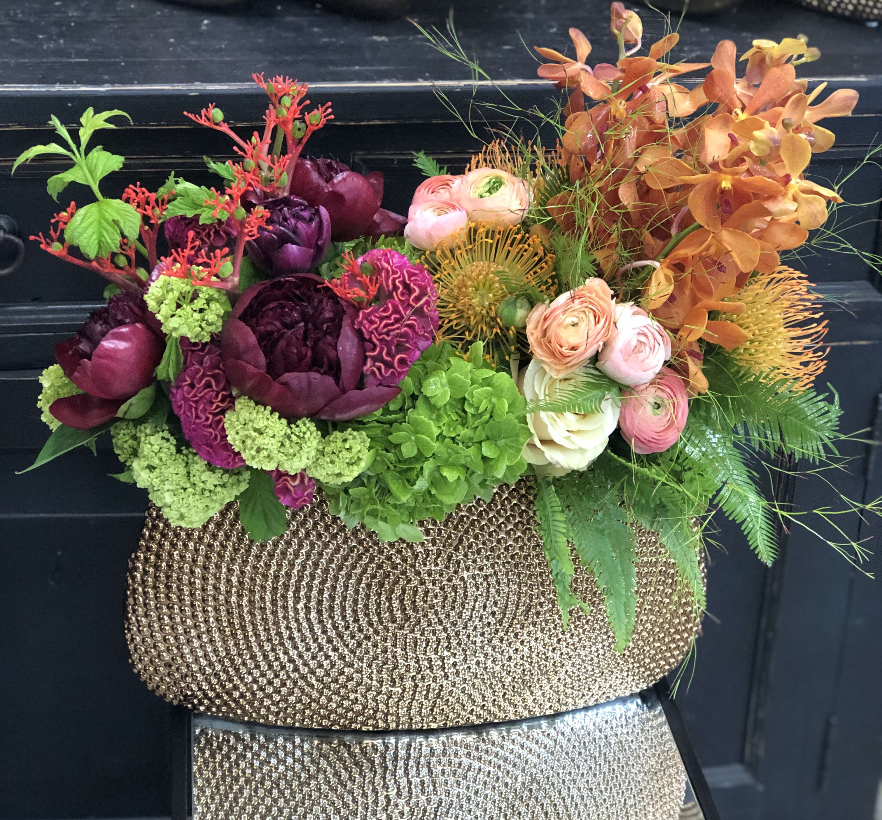  Thanksgiving Celebration arrangment! - A bright Thanksgiving arrangment with gorgeous combination of burgundy peonies, hydrangeas, orchids, roses, peach ranunculus, and tropical pincushions arranged in gold ceramic container.  
