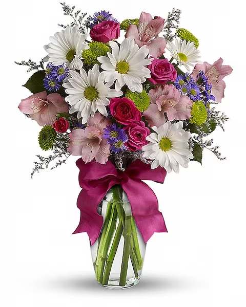 Pretty Please  - Looking for the prettiest bouquet in town? We've got the perfect all-around choice - a mix of blooms in breezy shades of pink, white, lavender and more, all tied up with a big pink bow! A great way to make someone smile. A mix of fresh flowers such as spray roses, daisy and button spray chrysanthemums, Monte Cassino asters and limonium, in shades of white, pink, green, purple and lavender. Delivered in a vase adorned with a matching ribbon